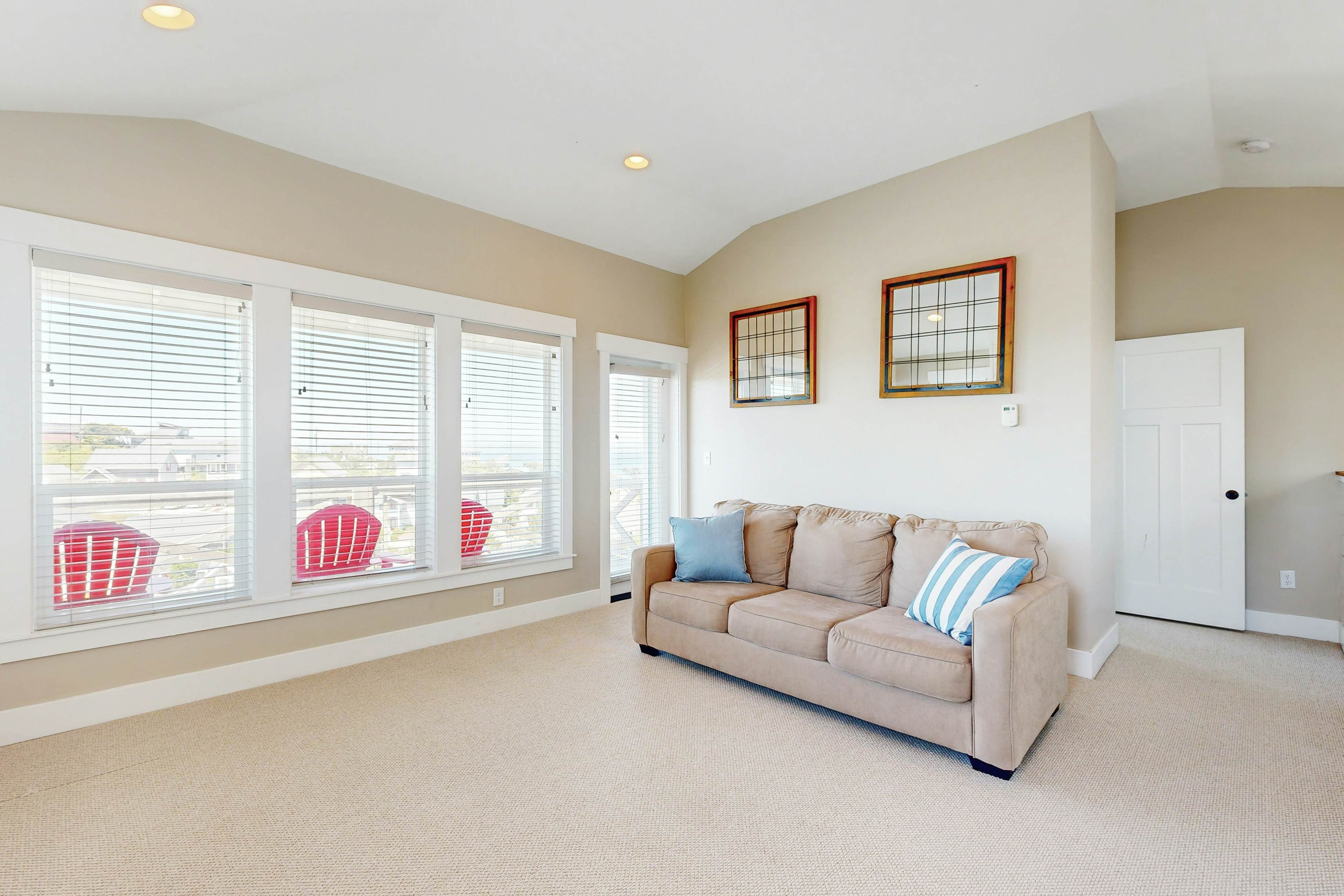 Ocean-view home in Olivia Beach with decks, fireplaces & pool access - dogs ok