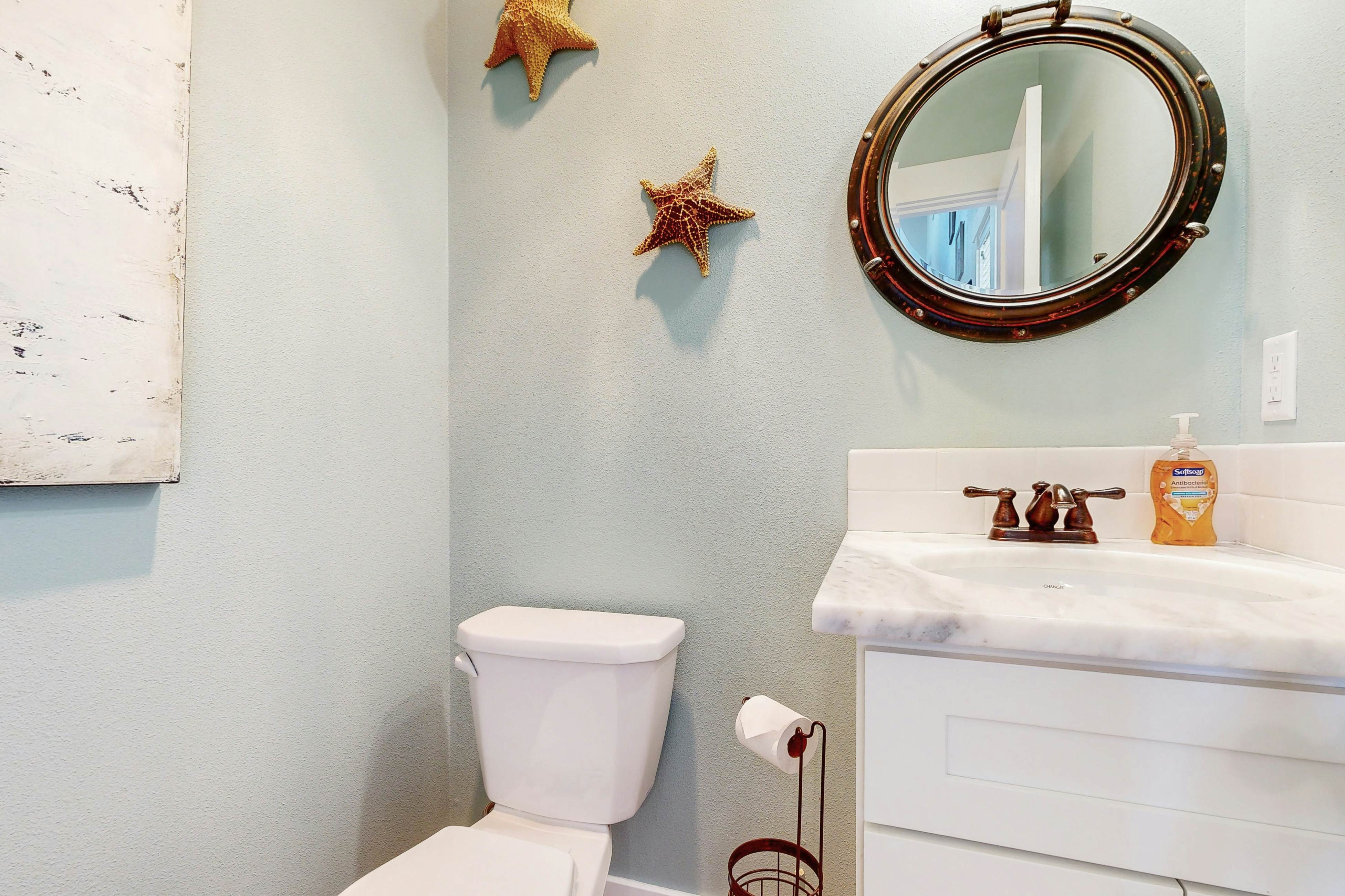 Ocean-view home in Olivia Beach with decks, fireplaces & pool access - dogs ok