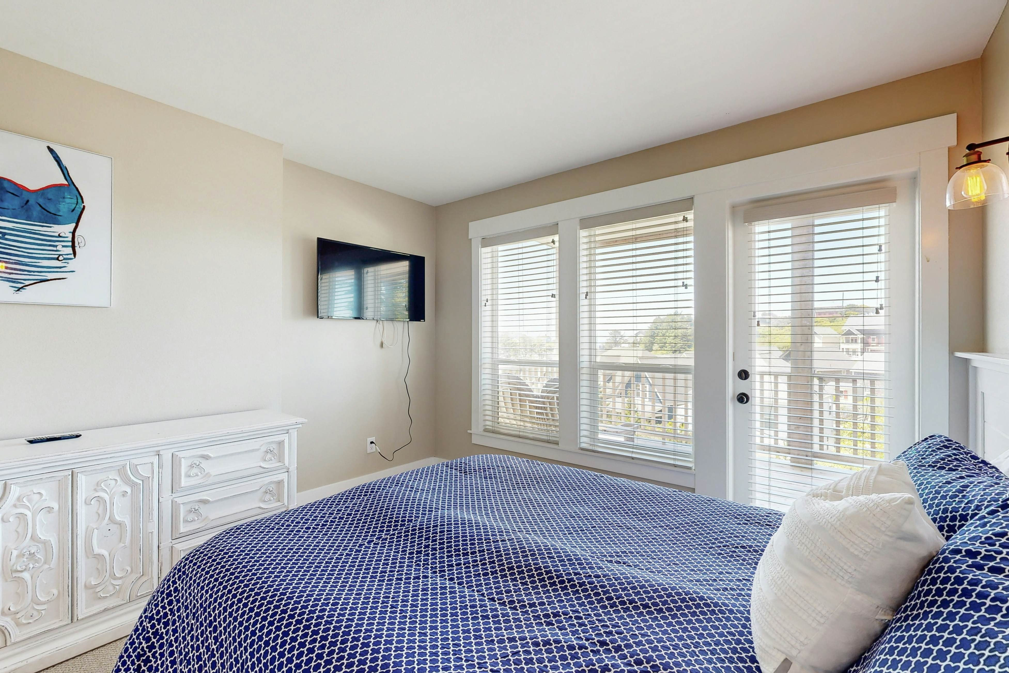 Ocean-view home in Olivia Beach with decks, fireplaces & pool access - dogs ok