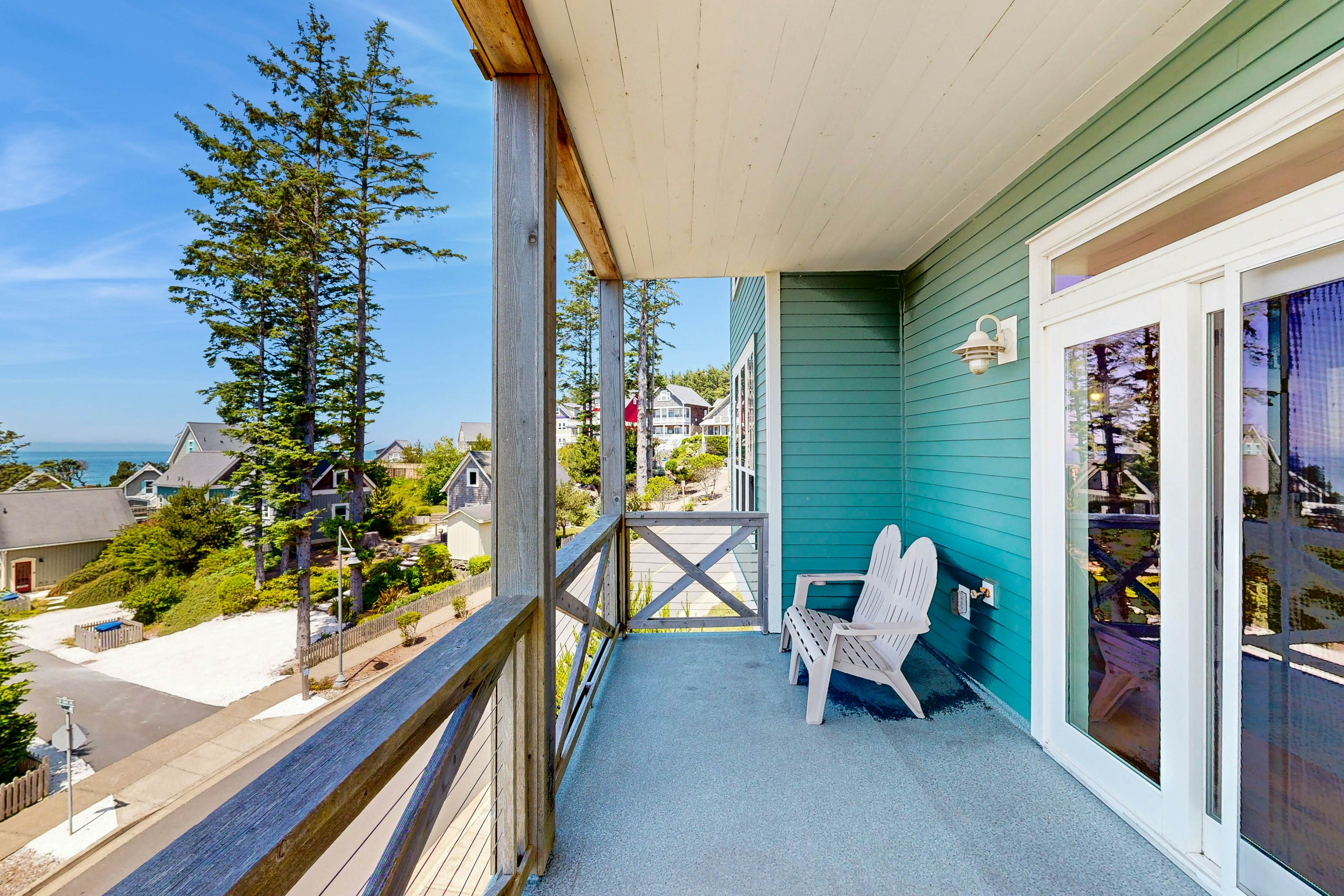 Ocean-view home in Olivia Beach with decks, fireplaces & pool access - dogs ok
