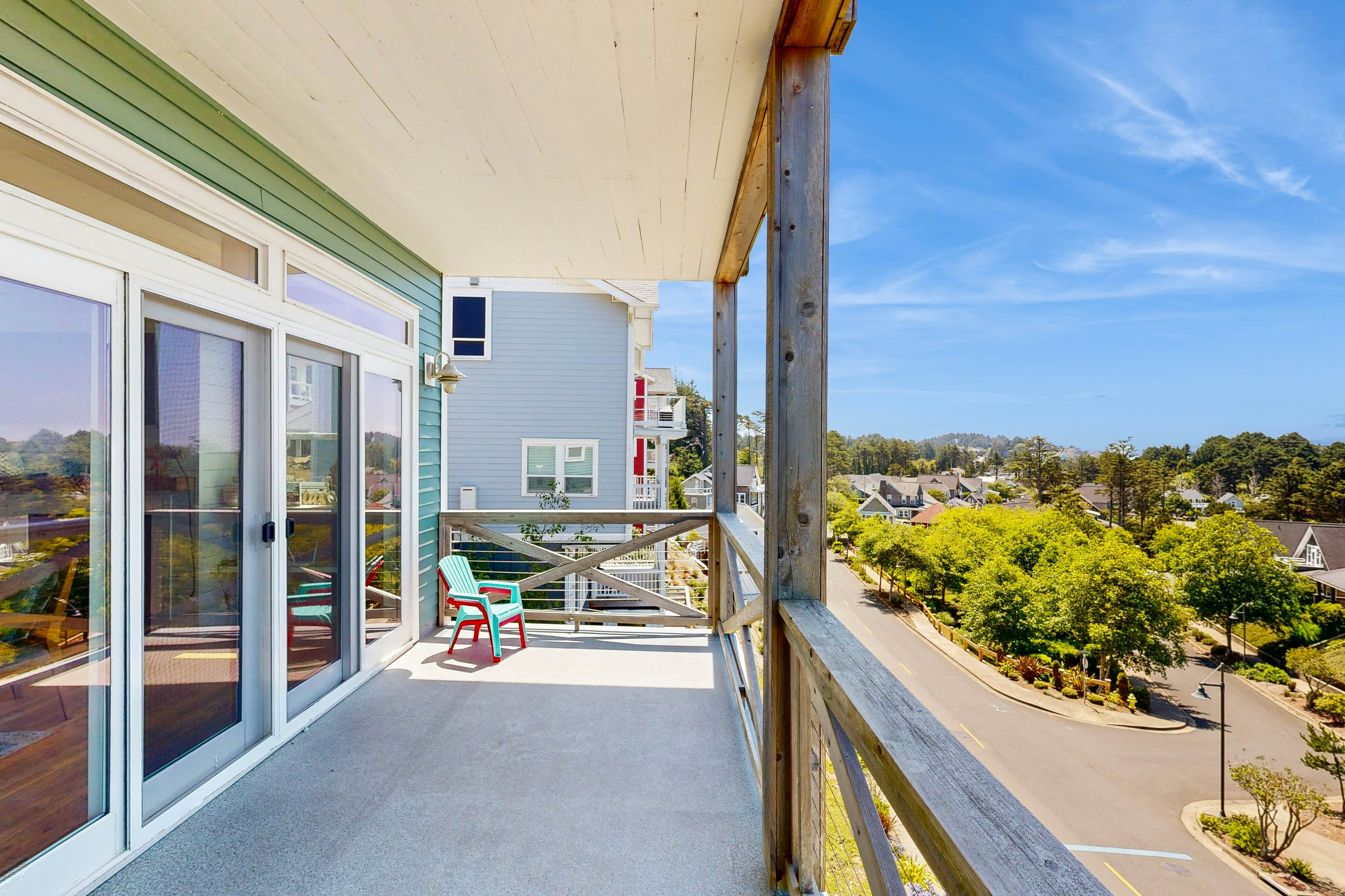 Ocean-view home in Olivia Beach with decks, fireplaces & pool access - dogs ok
