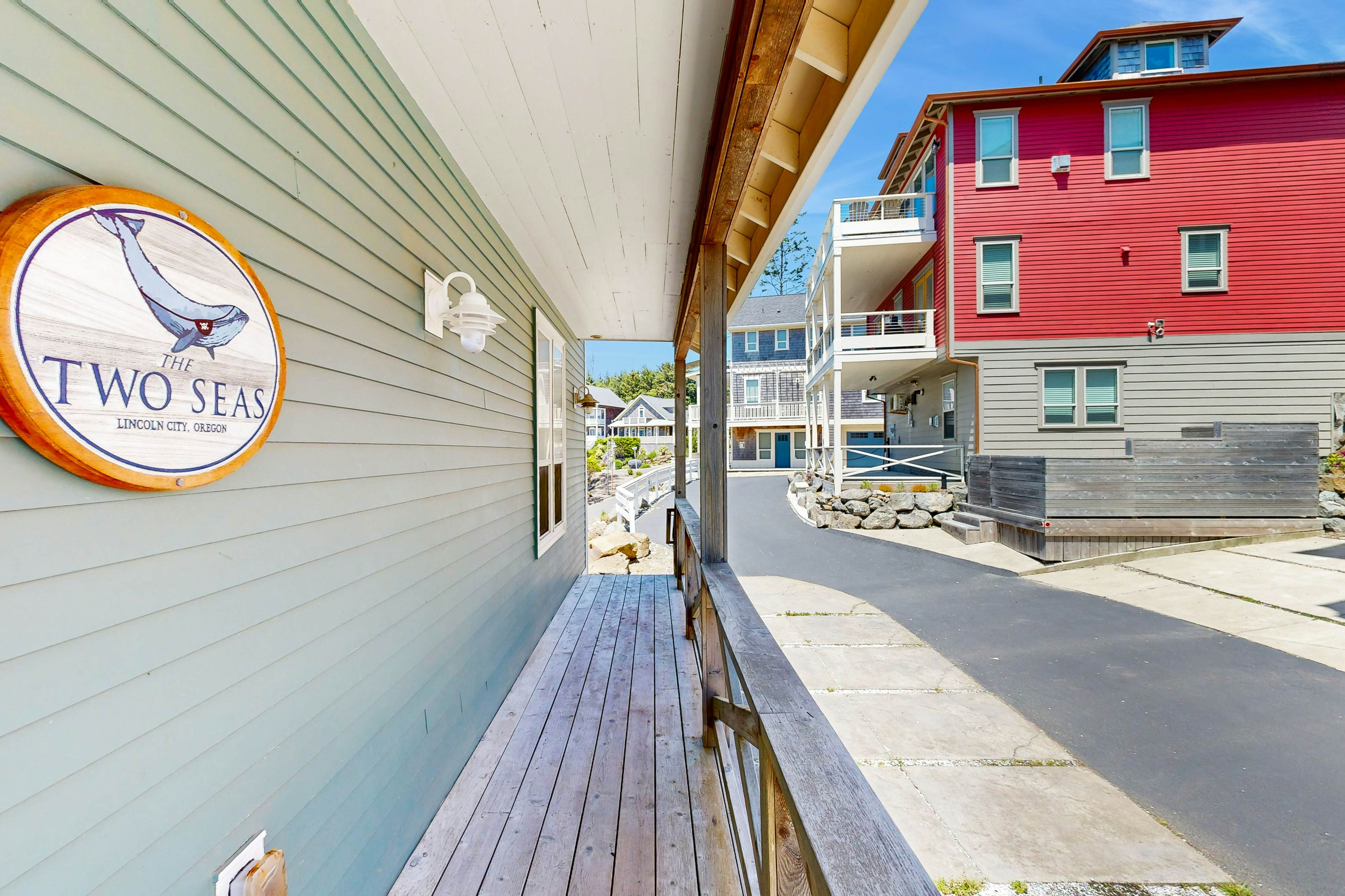 Ocean-view home in Olivia Beach with decks, fireplaces & pool access - dogs ok