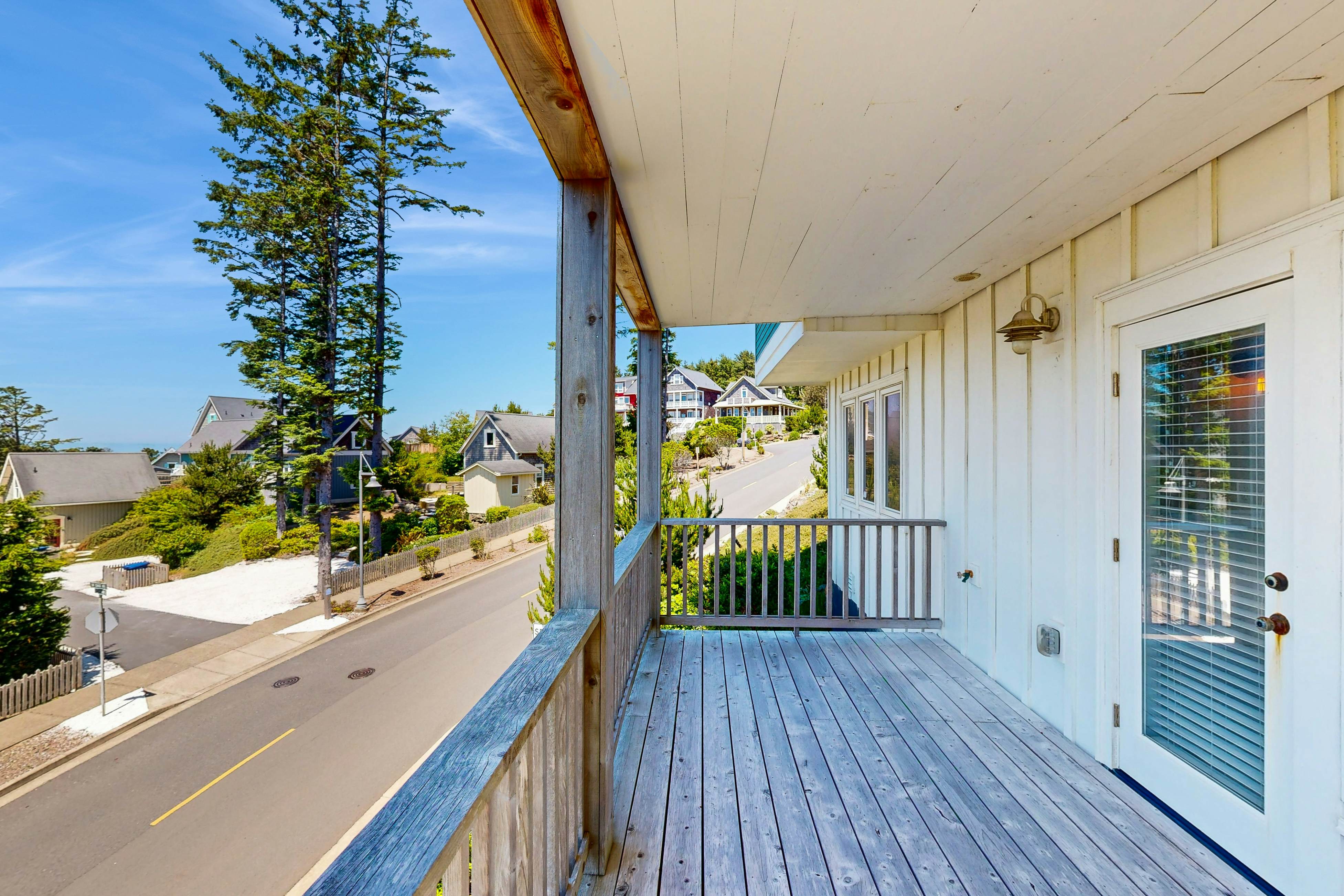 Ocean-view home in Olivia Beach with decks, fireplaces & pool access - dogs ok