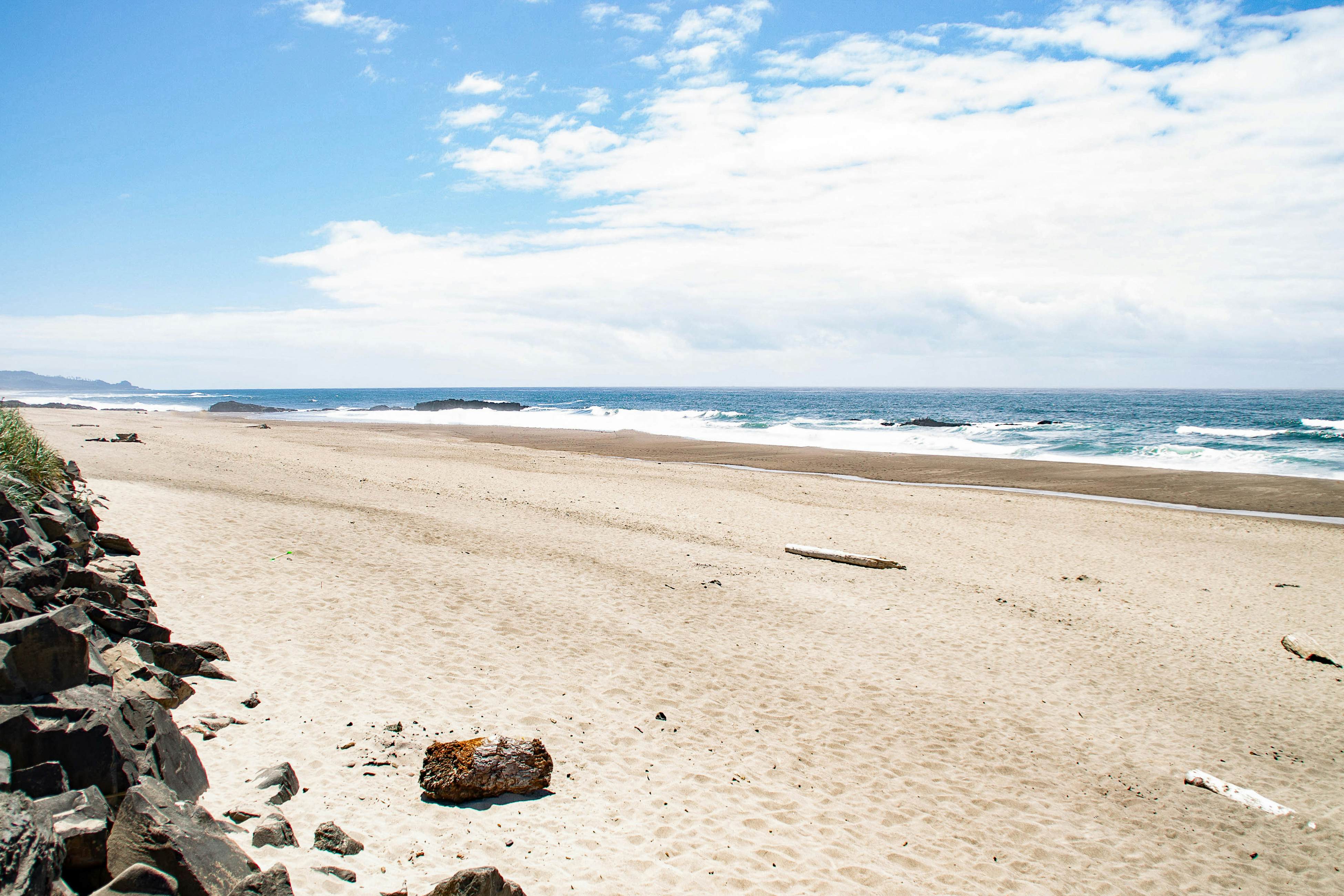 Ocean-view home in Olivia Beach with decks, fireplaces & pool access - dogs ok