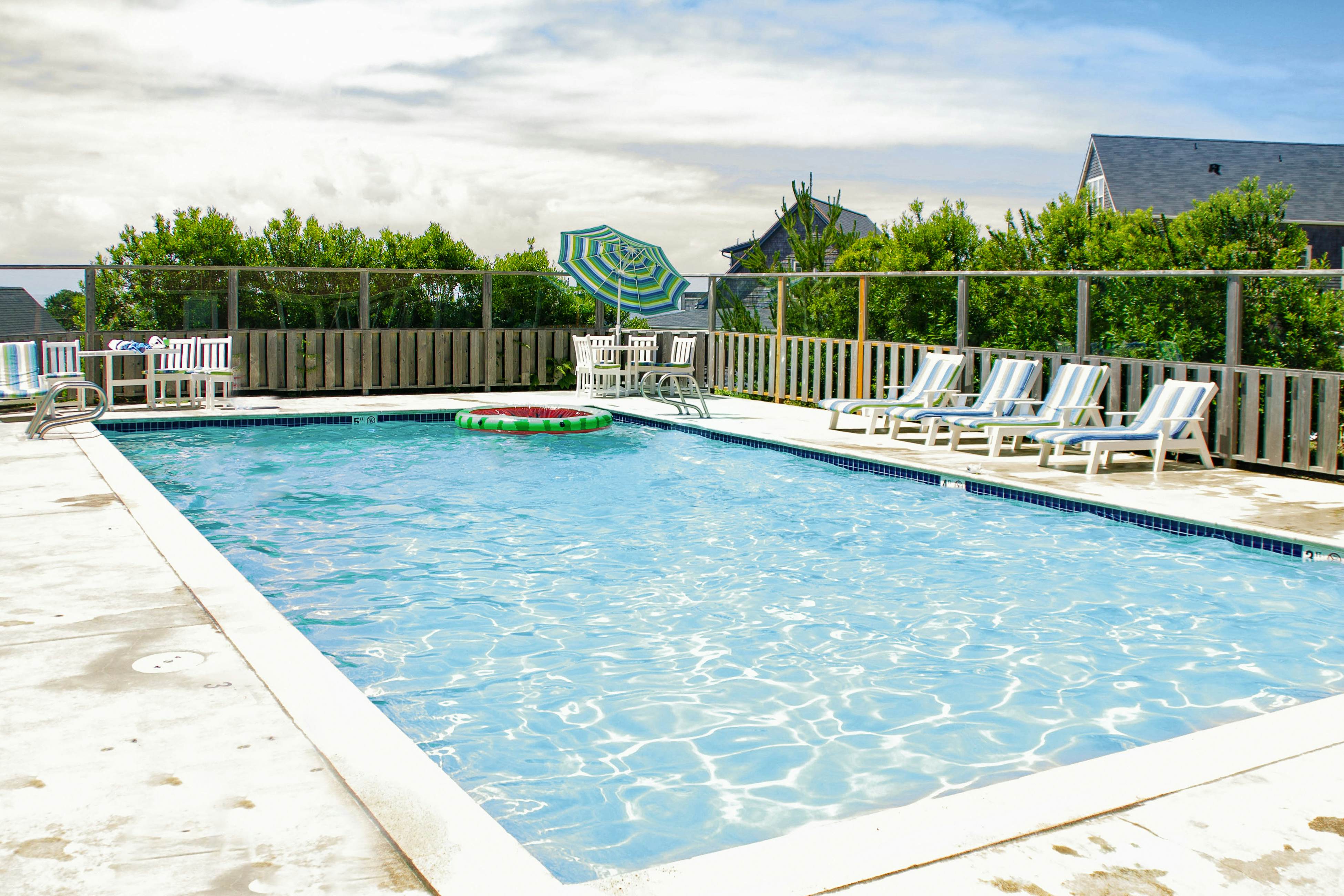 Ocean-view home in Olivia Beach with decks, fireplaces & pool access - dogs ok