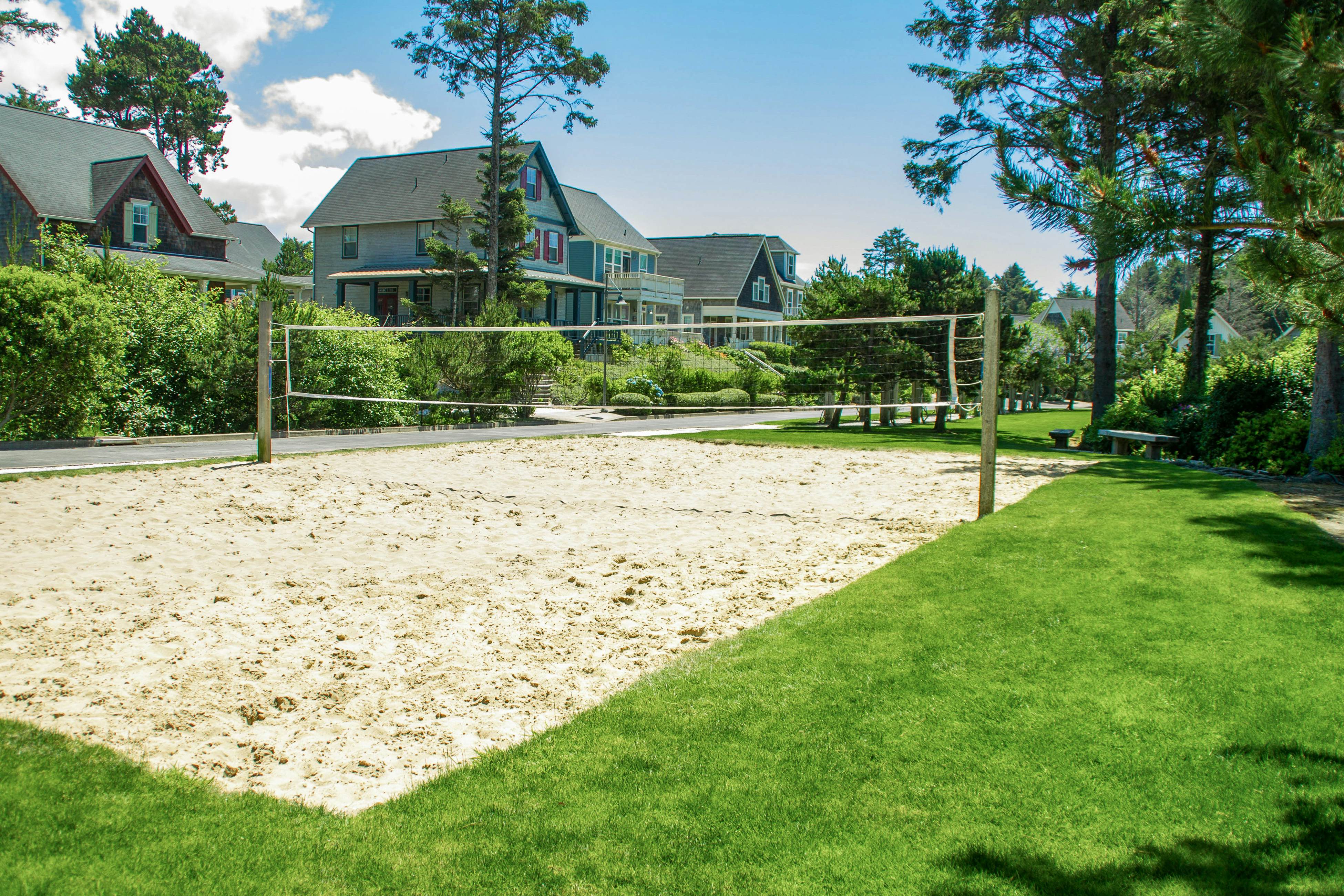 Ocean-view home in Olivia Beach with decks, fireplaces & pool access - dogs ok