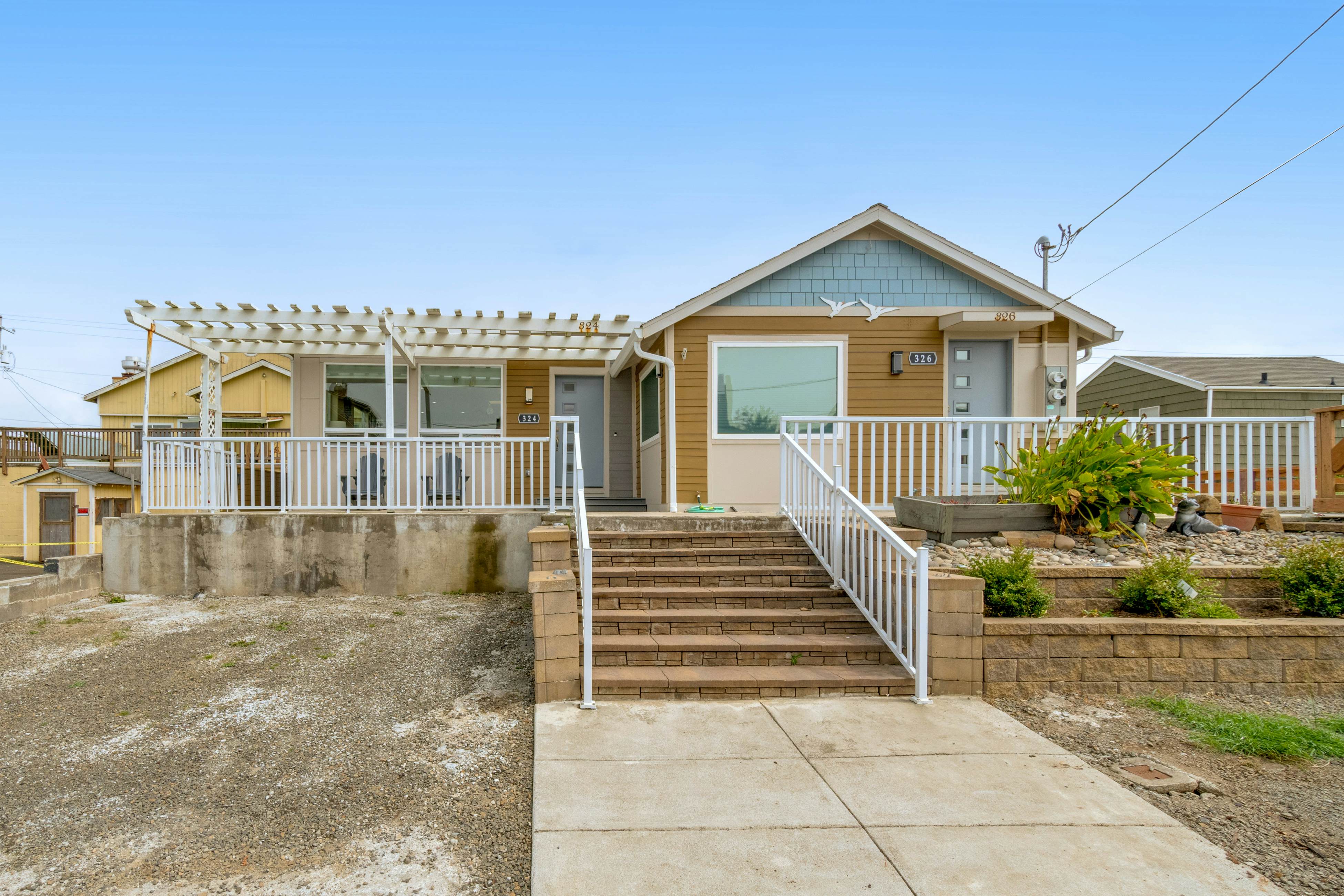 Light-filled home in the heart of town with deck & W/D - steps to beach access