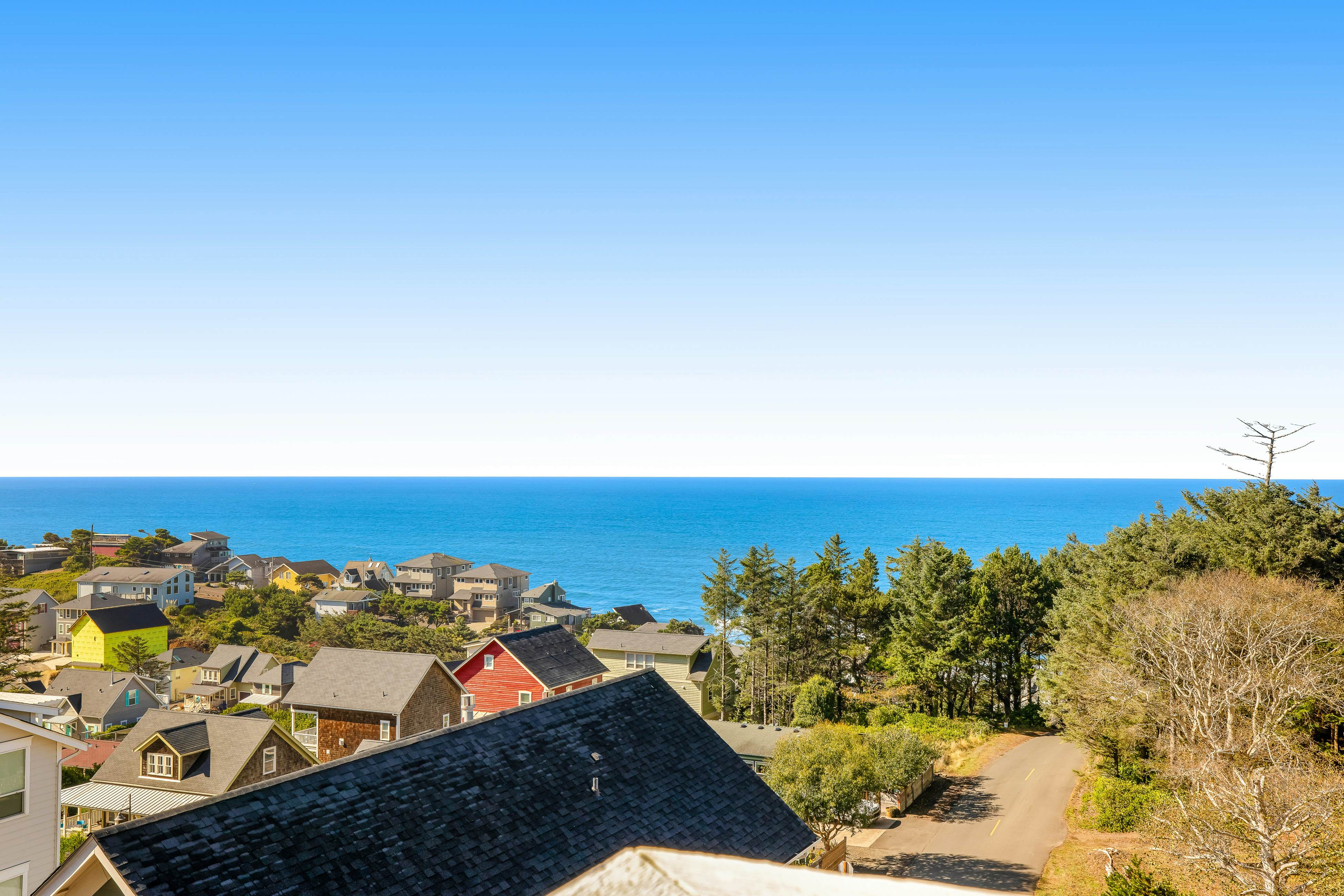 Gorgeous Ocean View Home w/ Private Hot Tub, Fast WiFi, Gas Fireplaces, and W/D