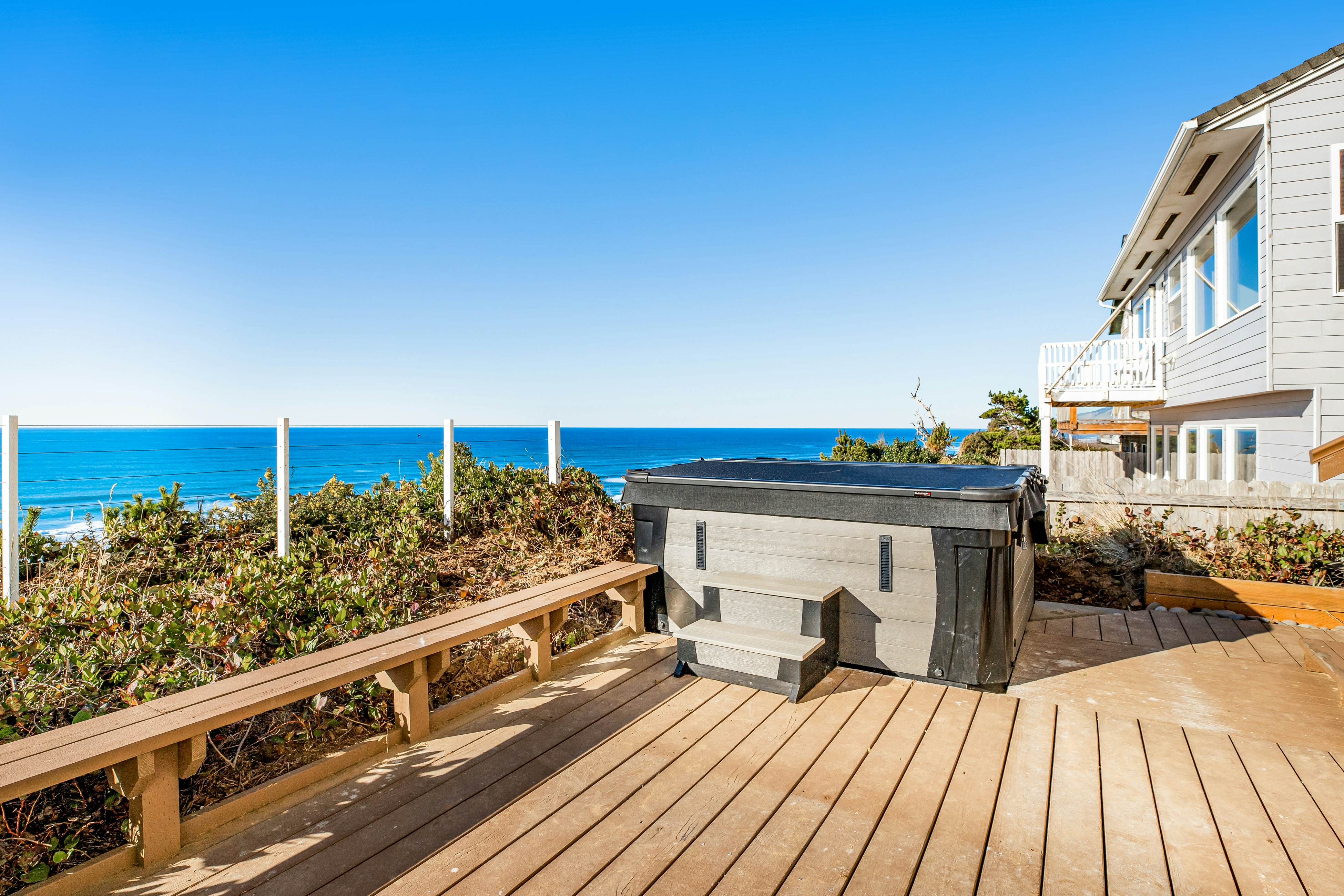Dog-friendly oceanfront home with views, fireplace, hot tub & washer/dryer
