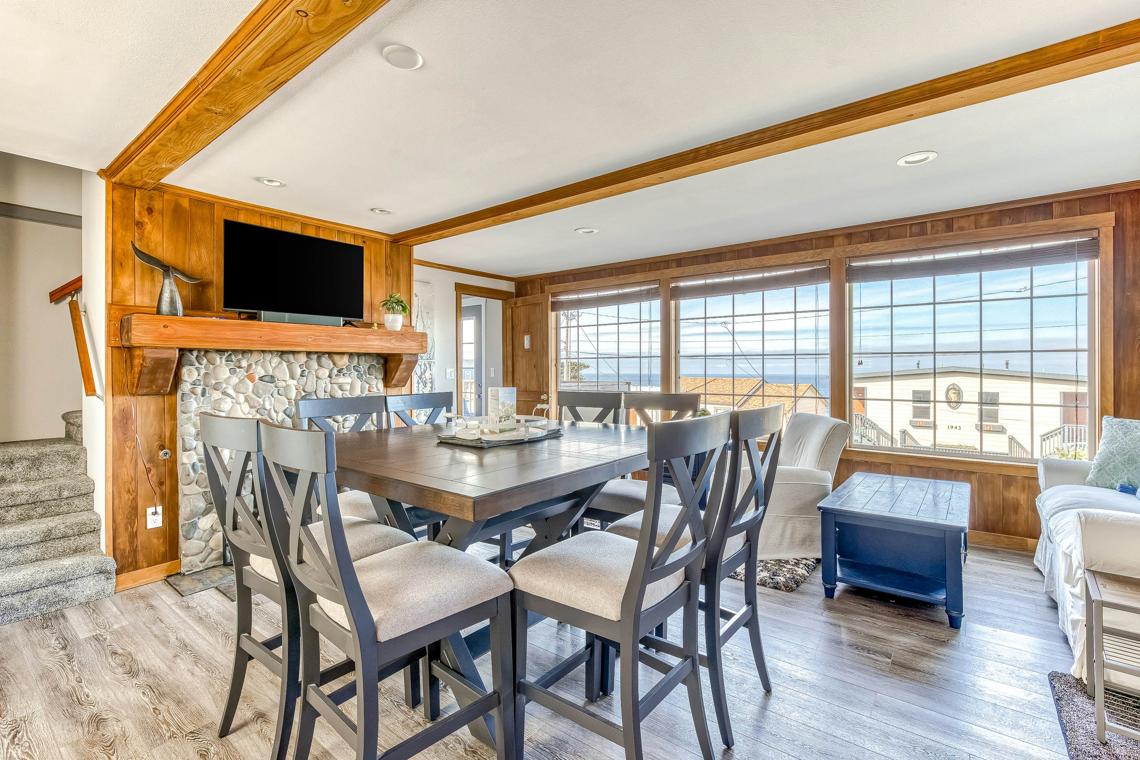 Ocean-view home 1 block from the beach with hot tub, deck, & fireplace