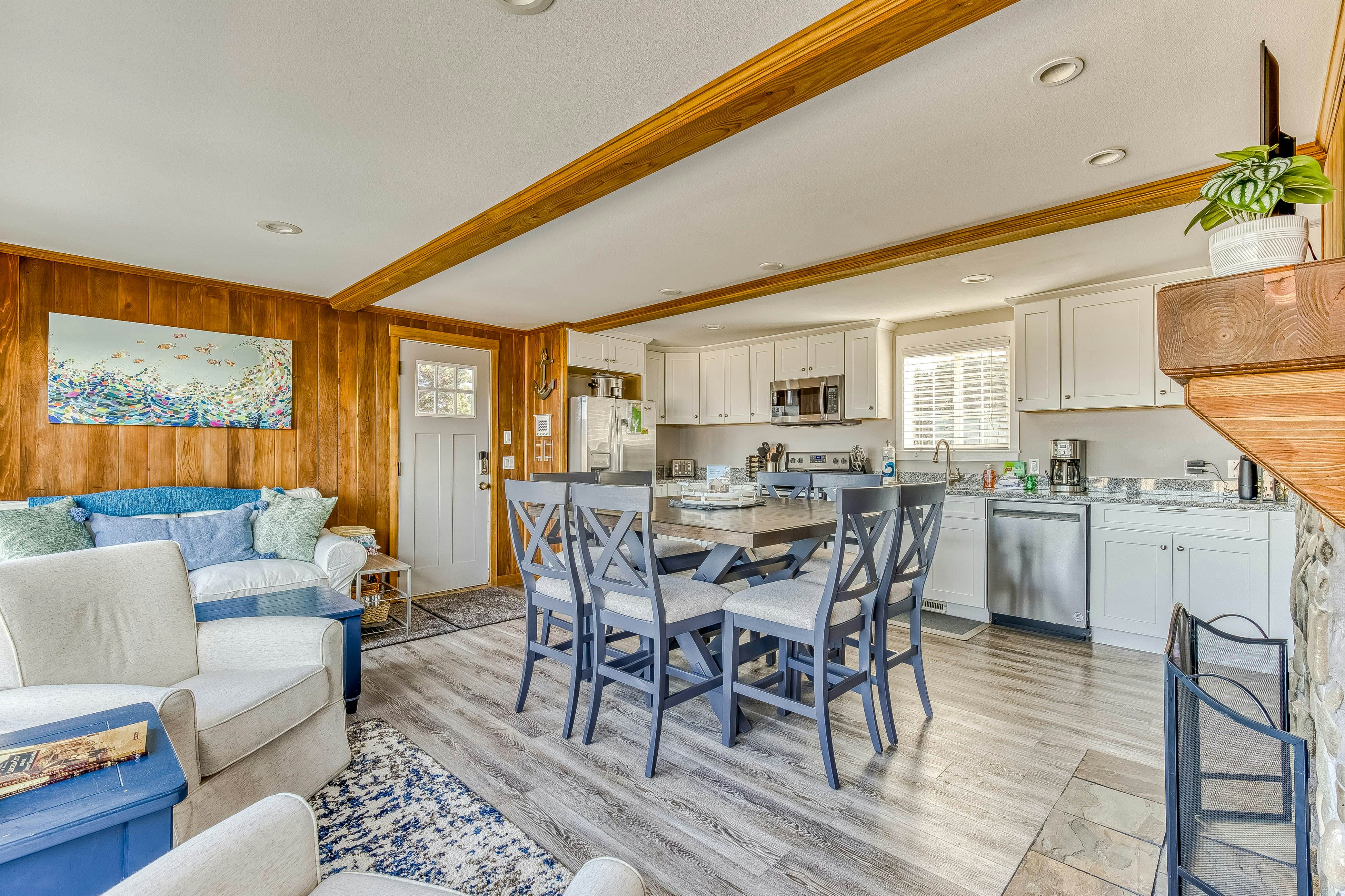 Ocean-view home 1 block from the beach with hot tub, deck, & fireplace