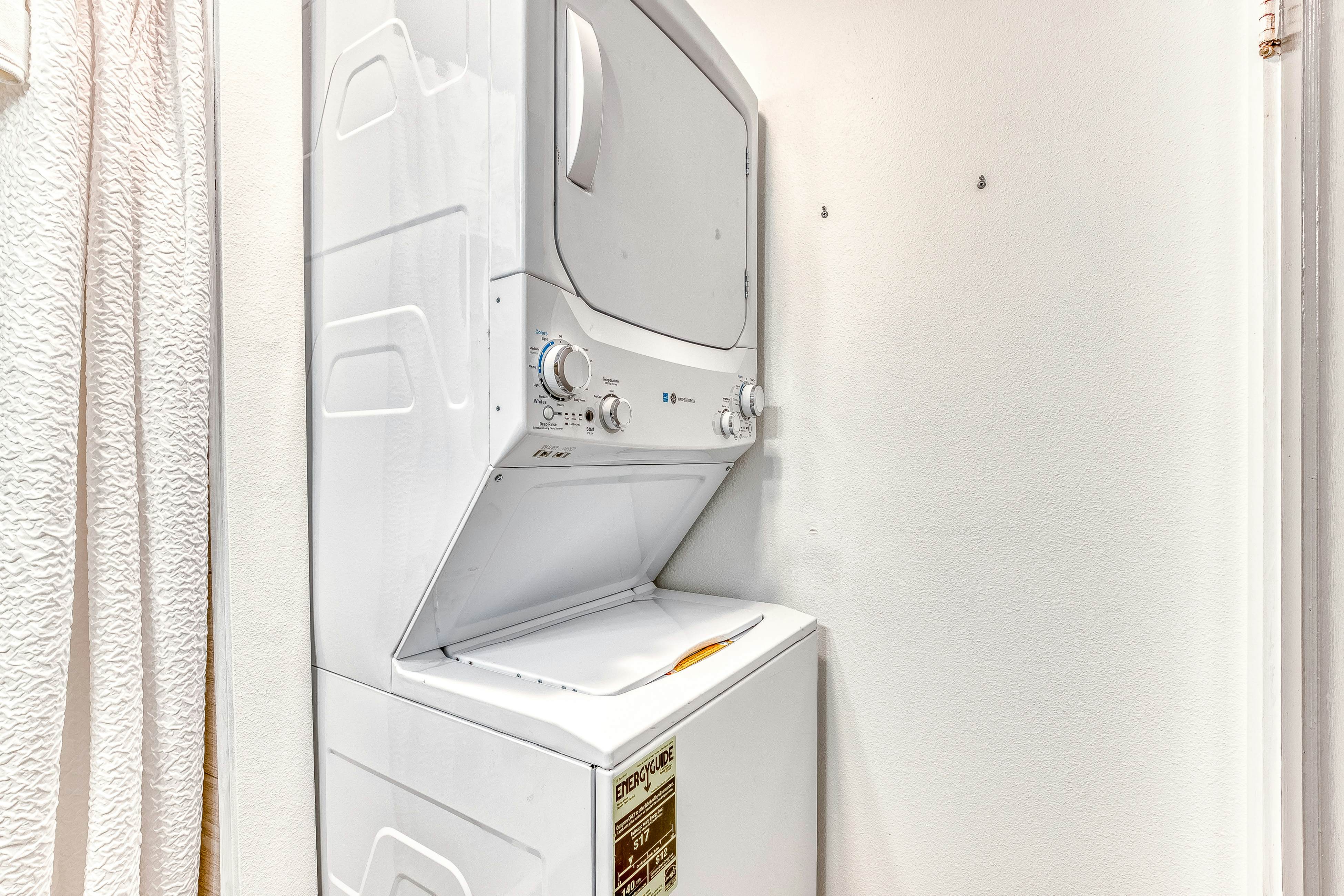 Ocean-view home 1 block from the beach with hot tub, deck, & fireplace