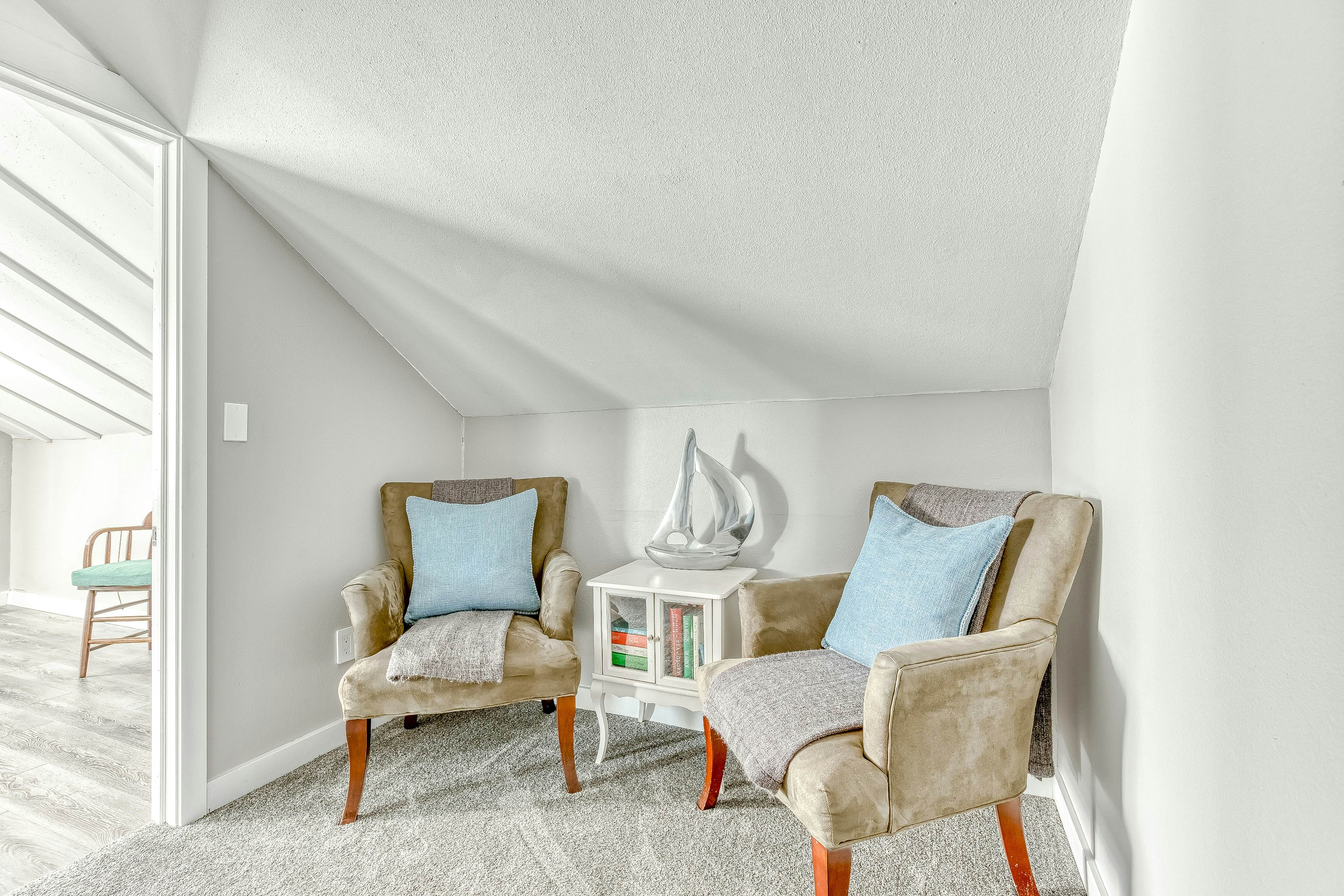 Ocean-view home 1 block from the beach with hot tub, deck, & fireplace