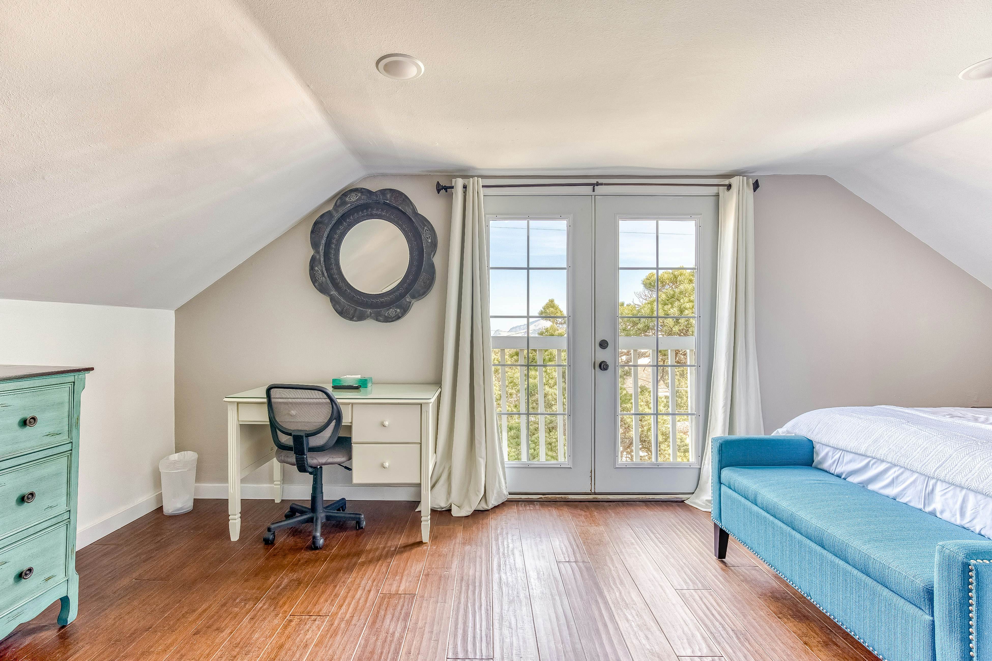 Ocean-view home 1 block from the beach with hot tub, deck, & fireplace