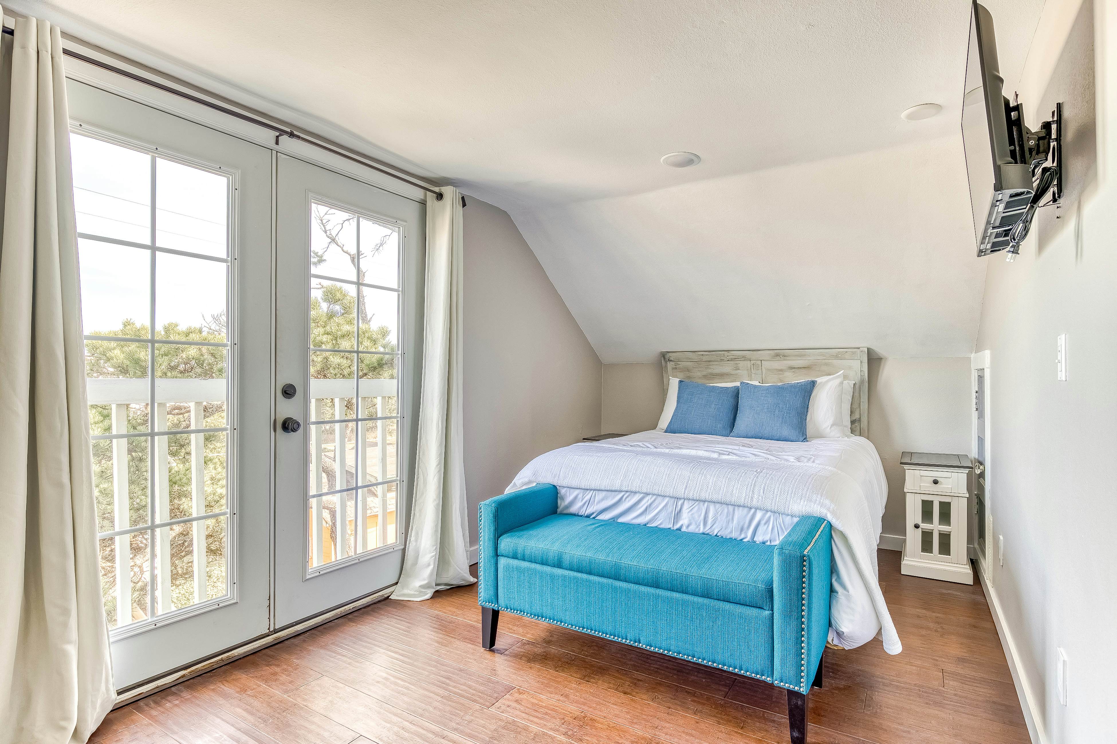 Ocean-view home 1 block from the beach with hot tub, deck, & fireplace