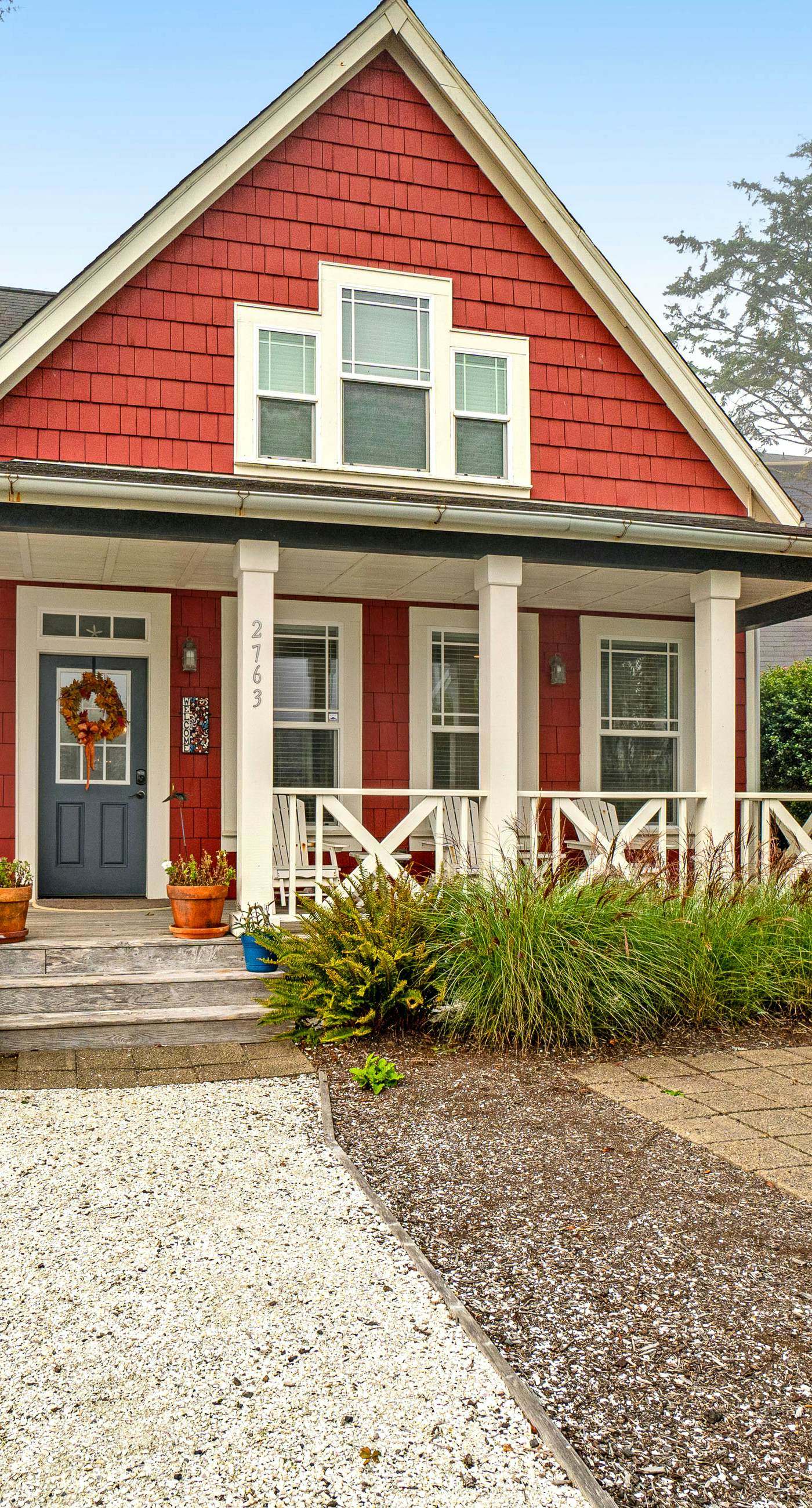 Romantic Oregon Coast Escape with Porch, Fireplace & Garden Charm