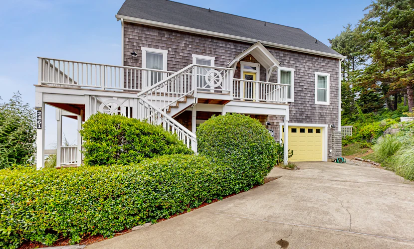 Ocean view home with hot tub game room furnished deck and fireplaces