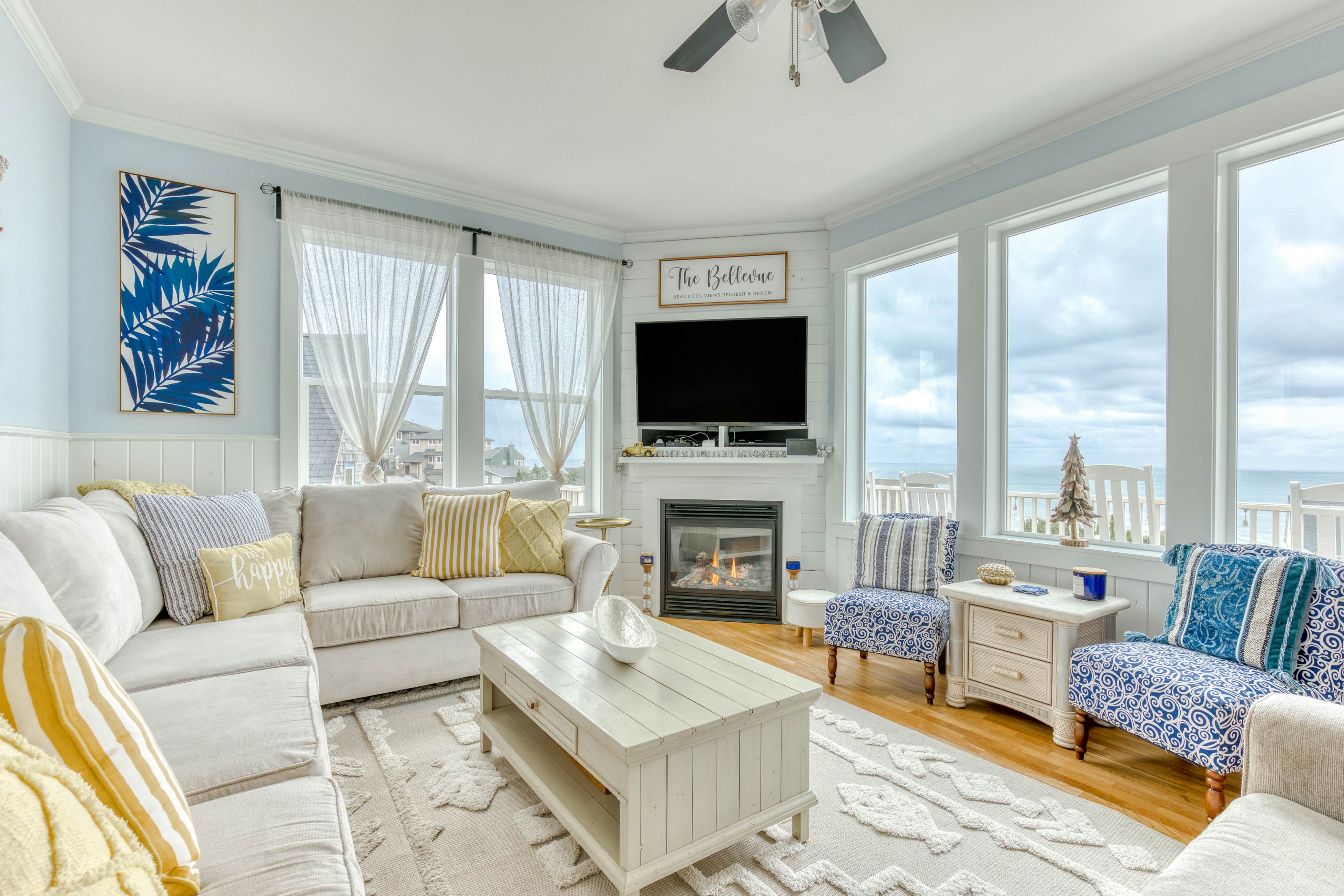 Ocean-view home with hot tub, game room, furnished deck, & fireplaces