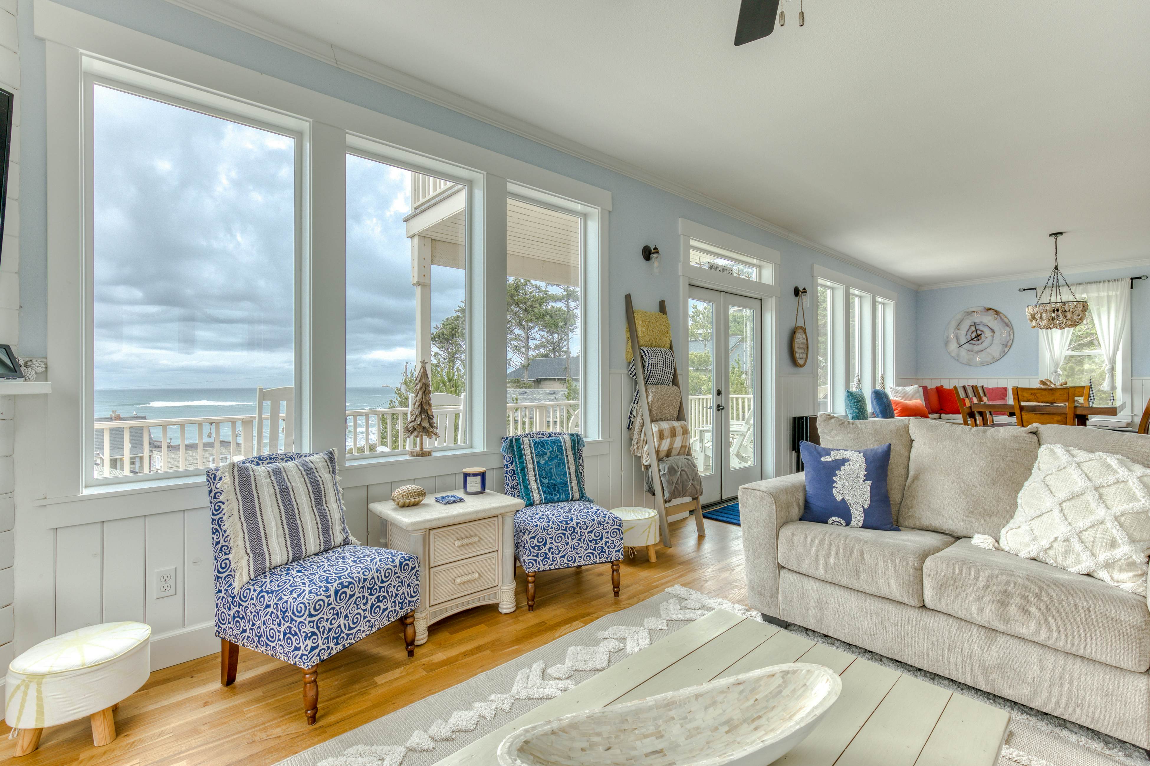 Ocean-view home with hot tub, game room, furnished deck, & fireplaces