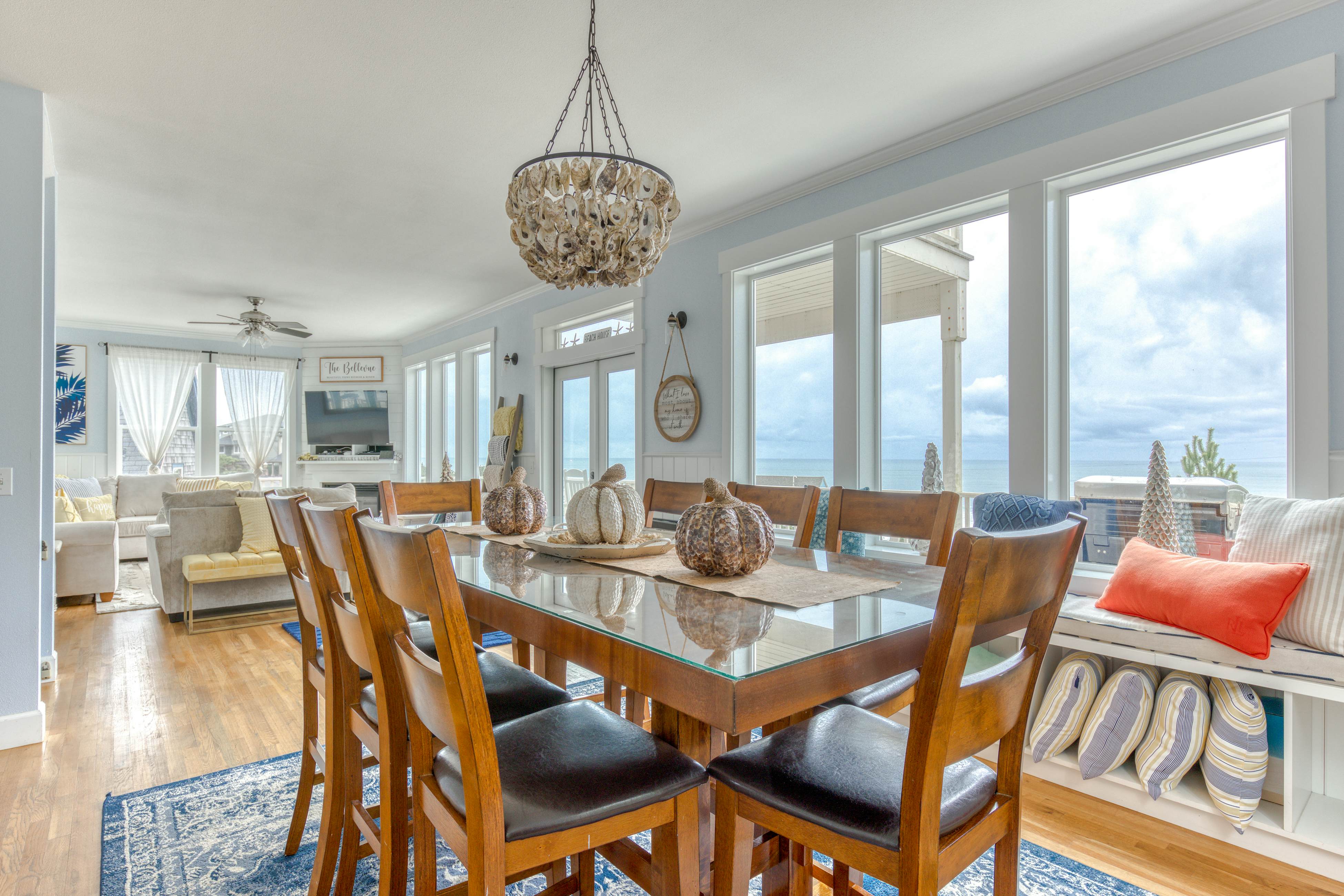 Ocean-view home with hot tub, game room, furnished deck, & fireplaces