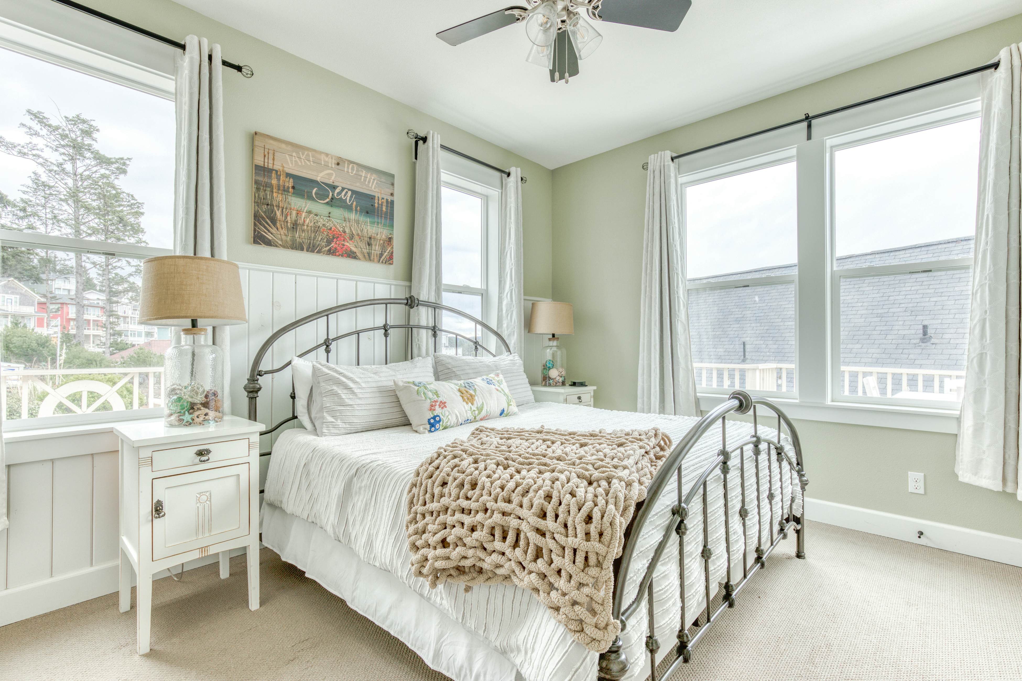 Ocean-view home with hot tub, game room, furnished deck, & fireplaces