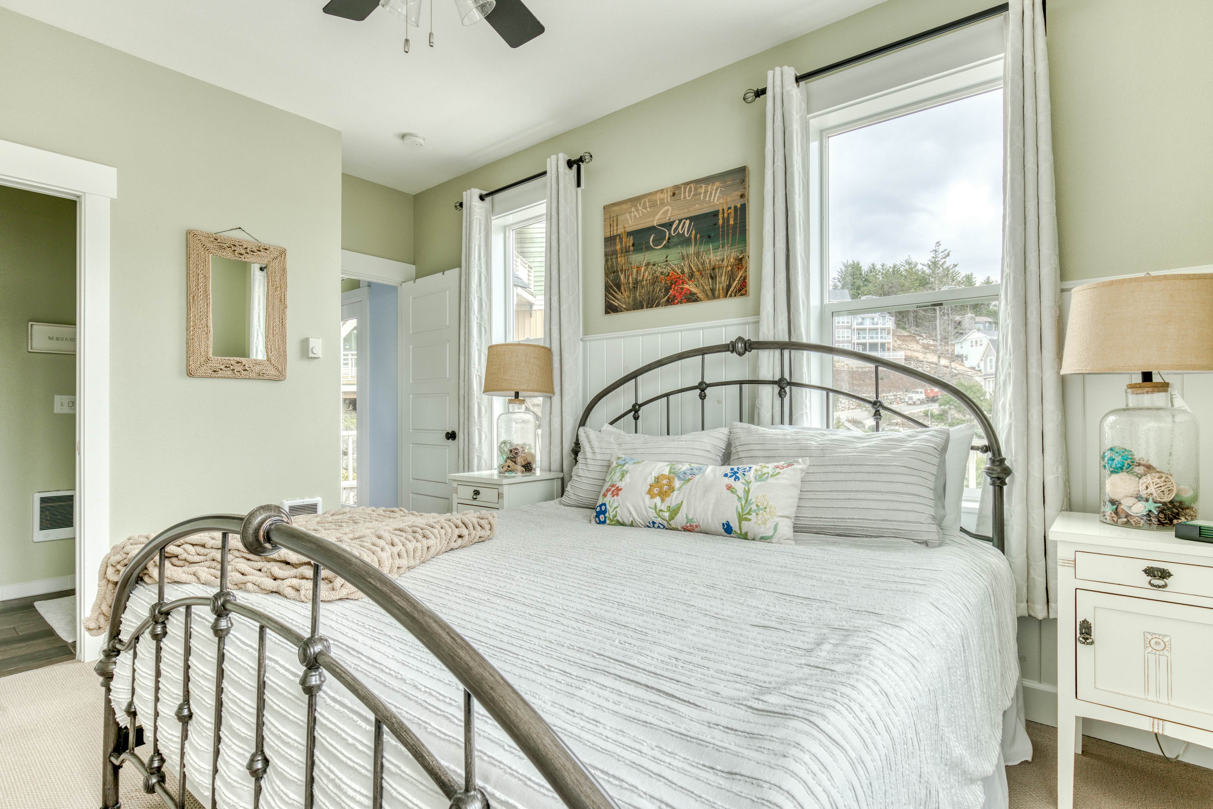 Ocean-view home with hot tub, game room, furnished deck, & fireplaces