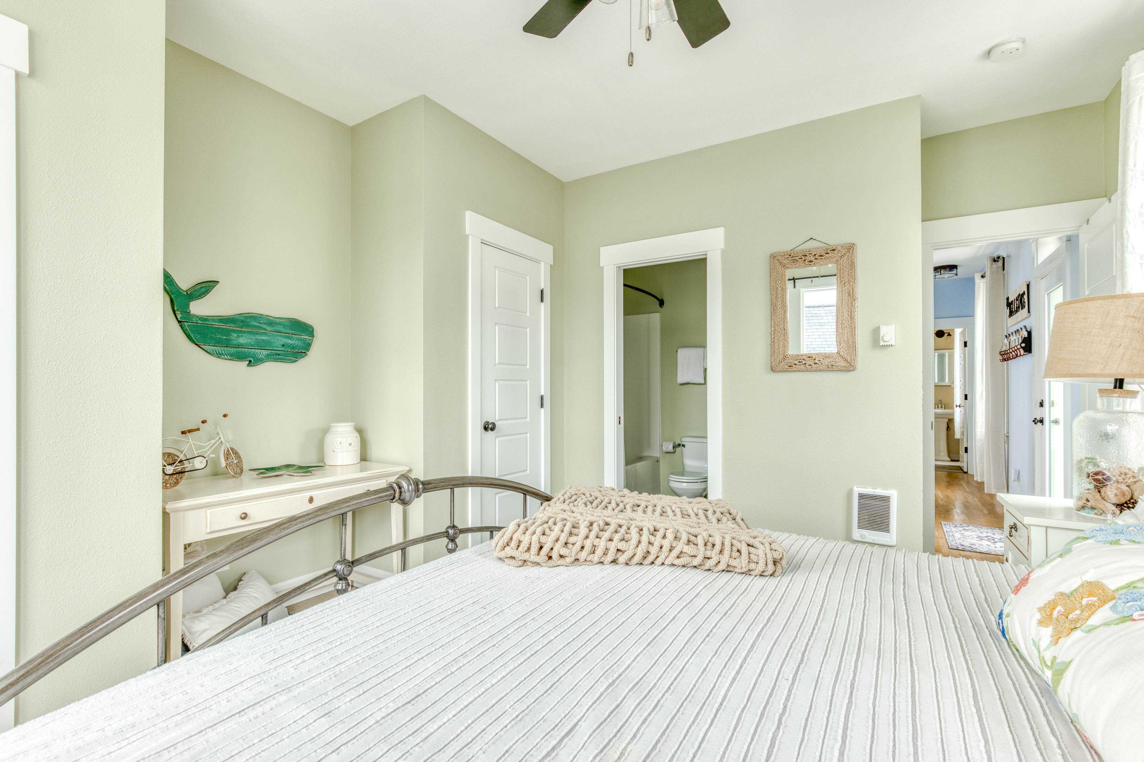 Ocean-view home with hot tub, game room, furnished deck, & fireplaces