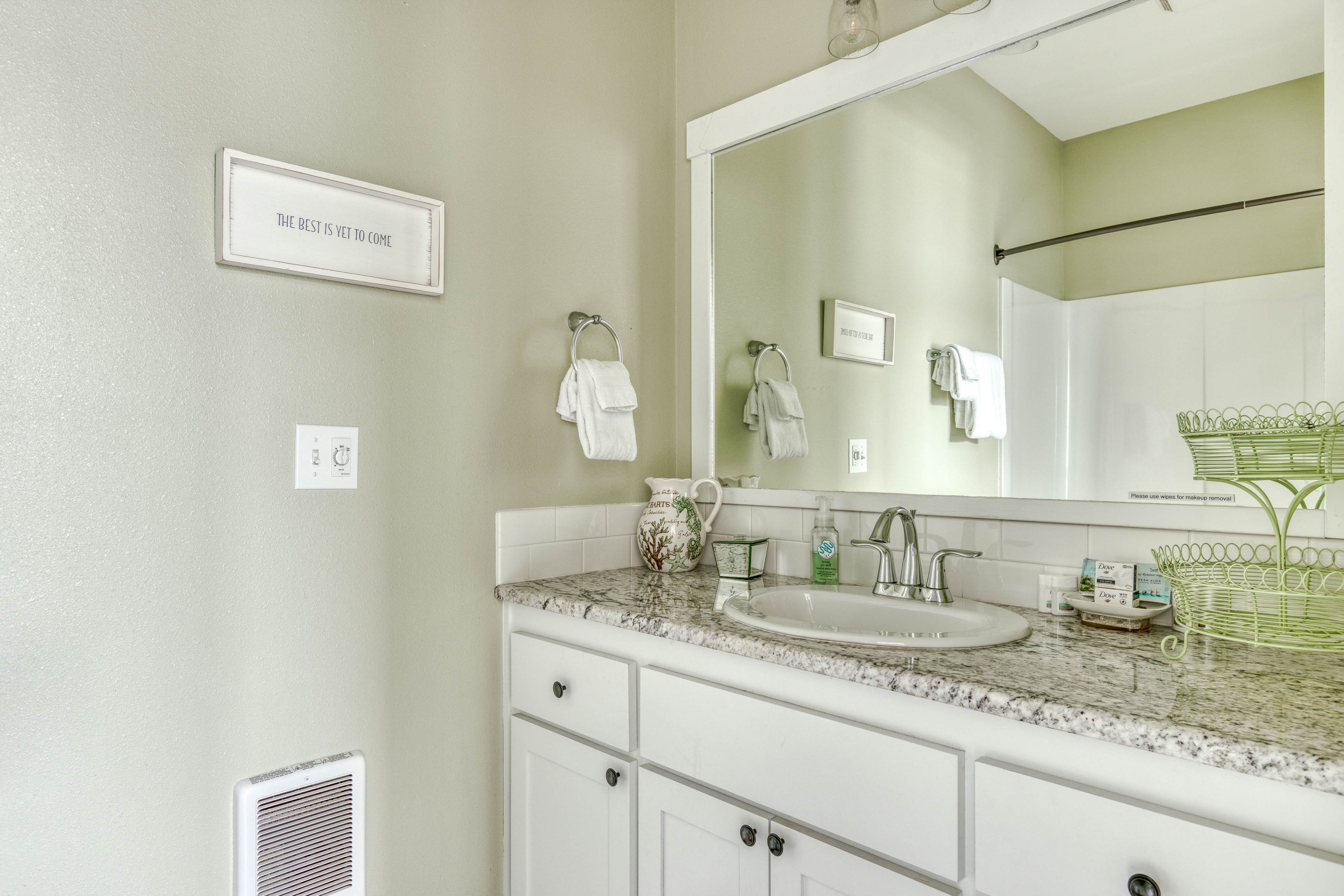 Ocean-view home with hot tub, game room, furnished deck, & fireplaces