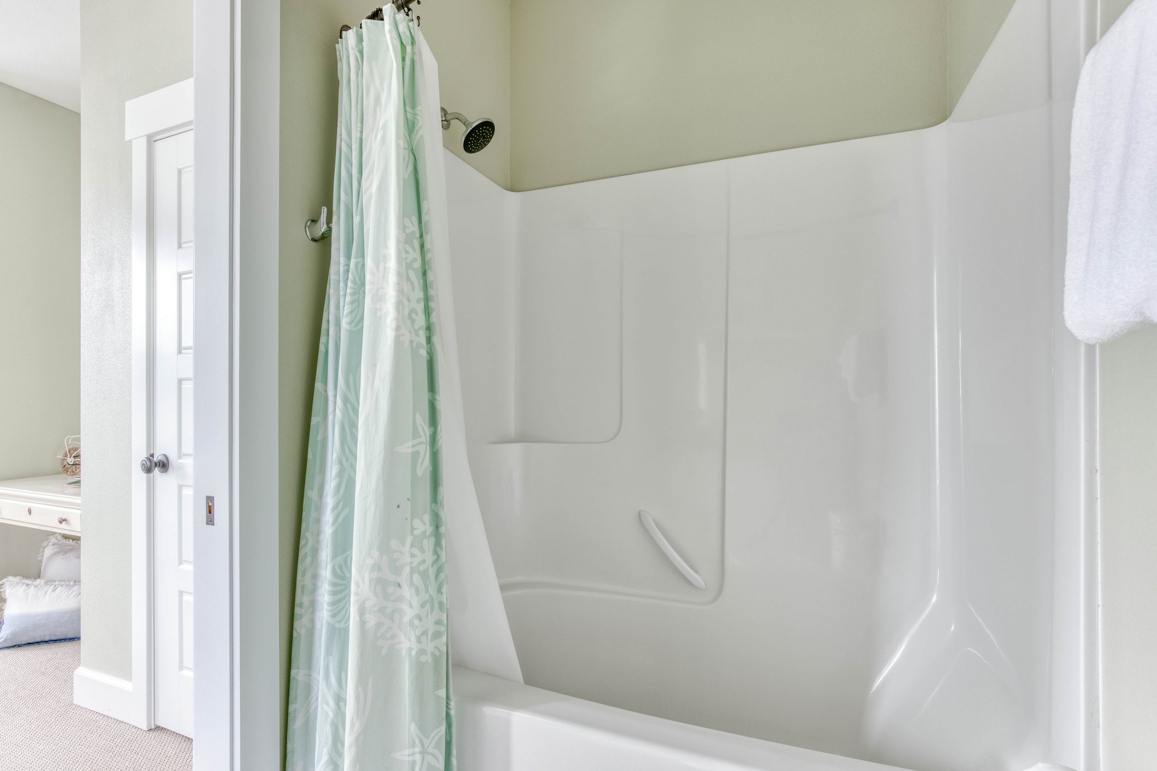 Ocean-view home with hot tub, game room, furnished deck, & fireplaces