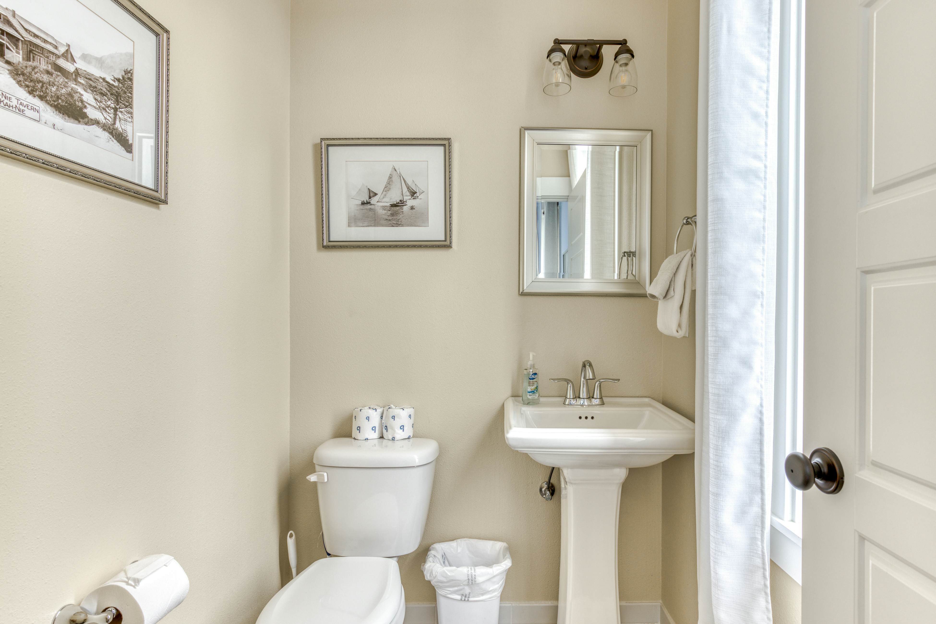 Ocean-view home with hot tub, game room, furnished deck, & fireplaces