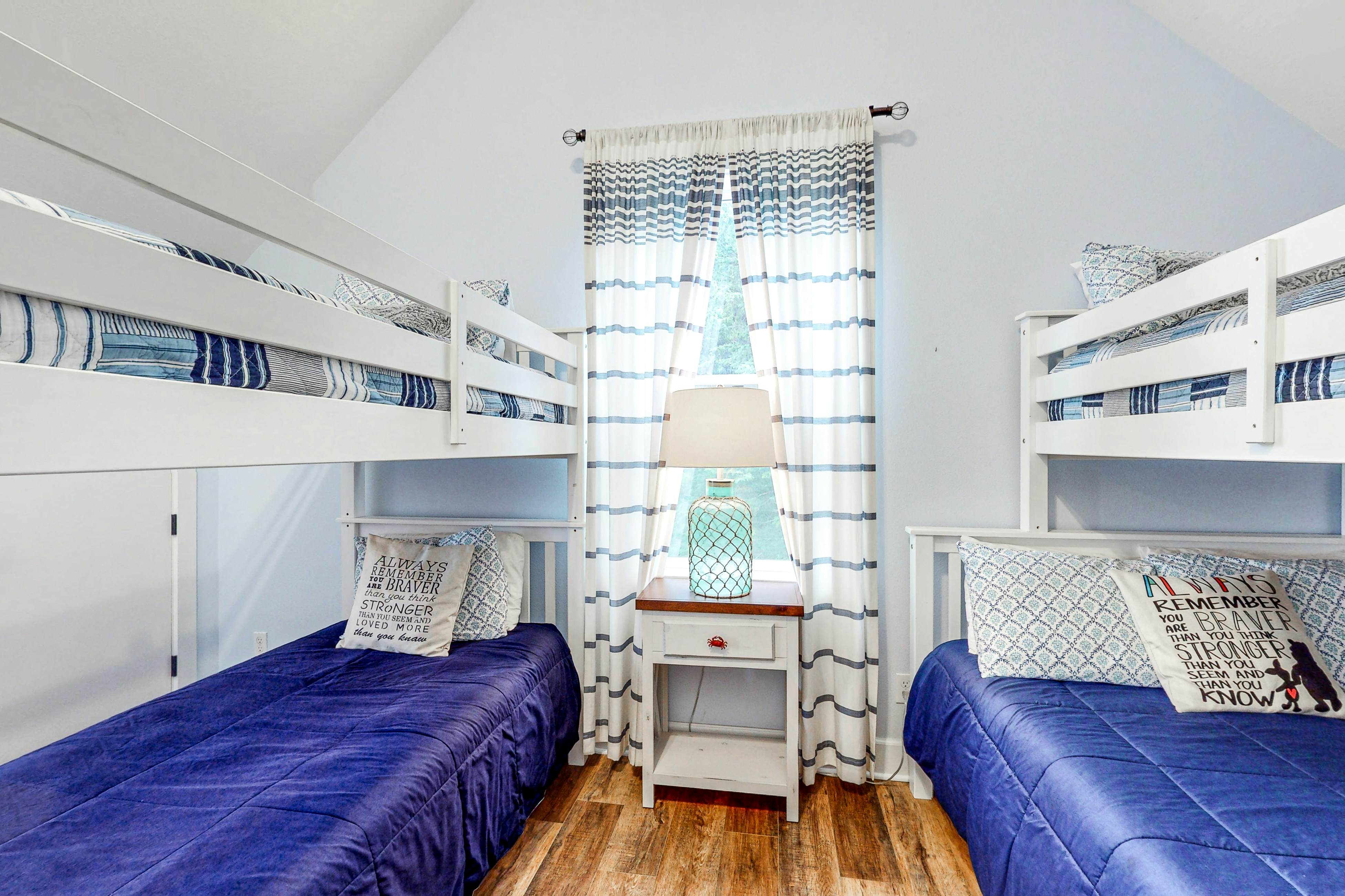 Ocean-view home with hot tub, game room, furnished deck, & fireplaces