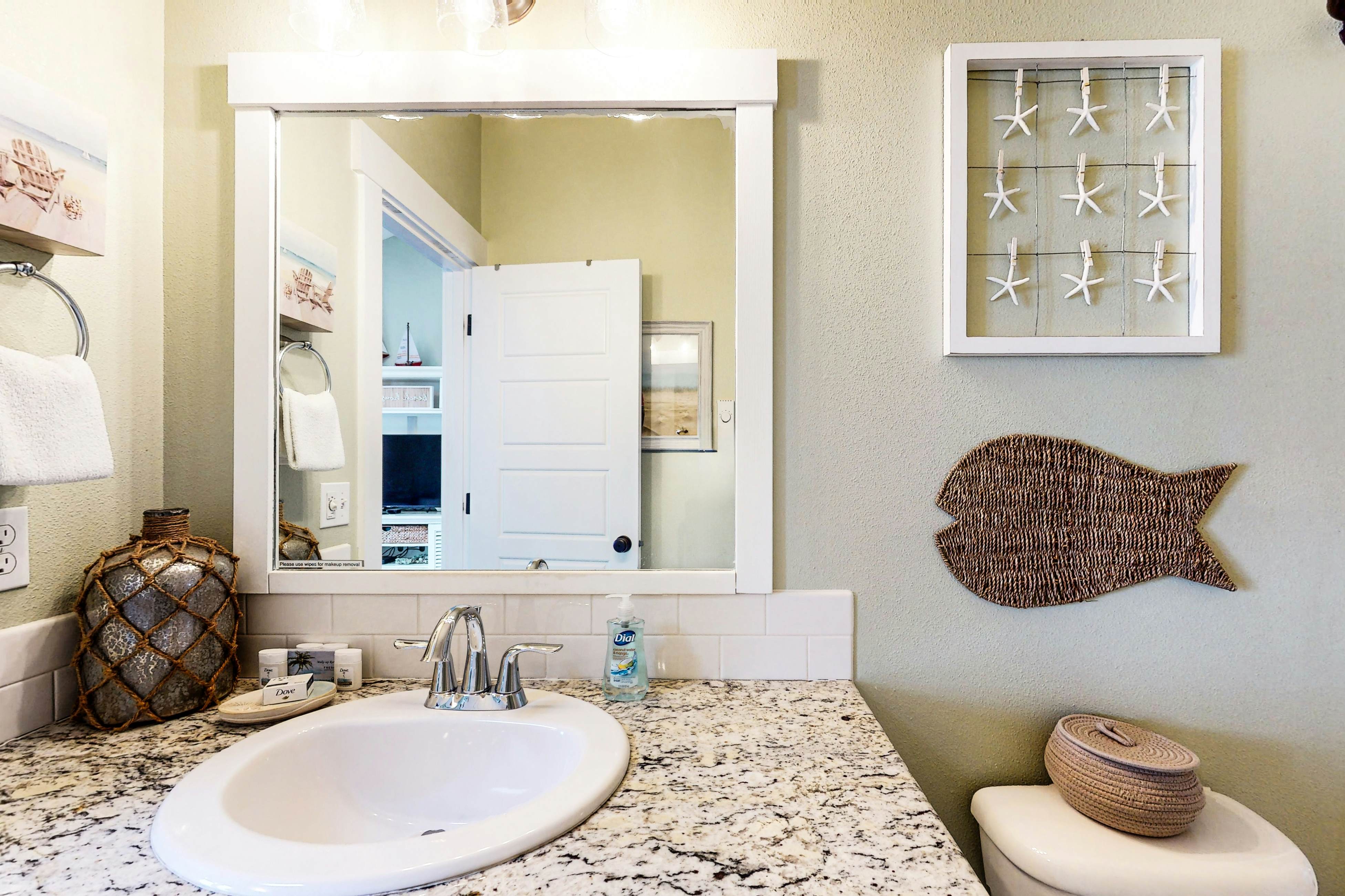 Ocean-view home with hot tub, game room, furnished deck, & fireplaces