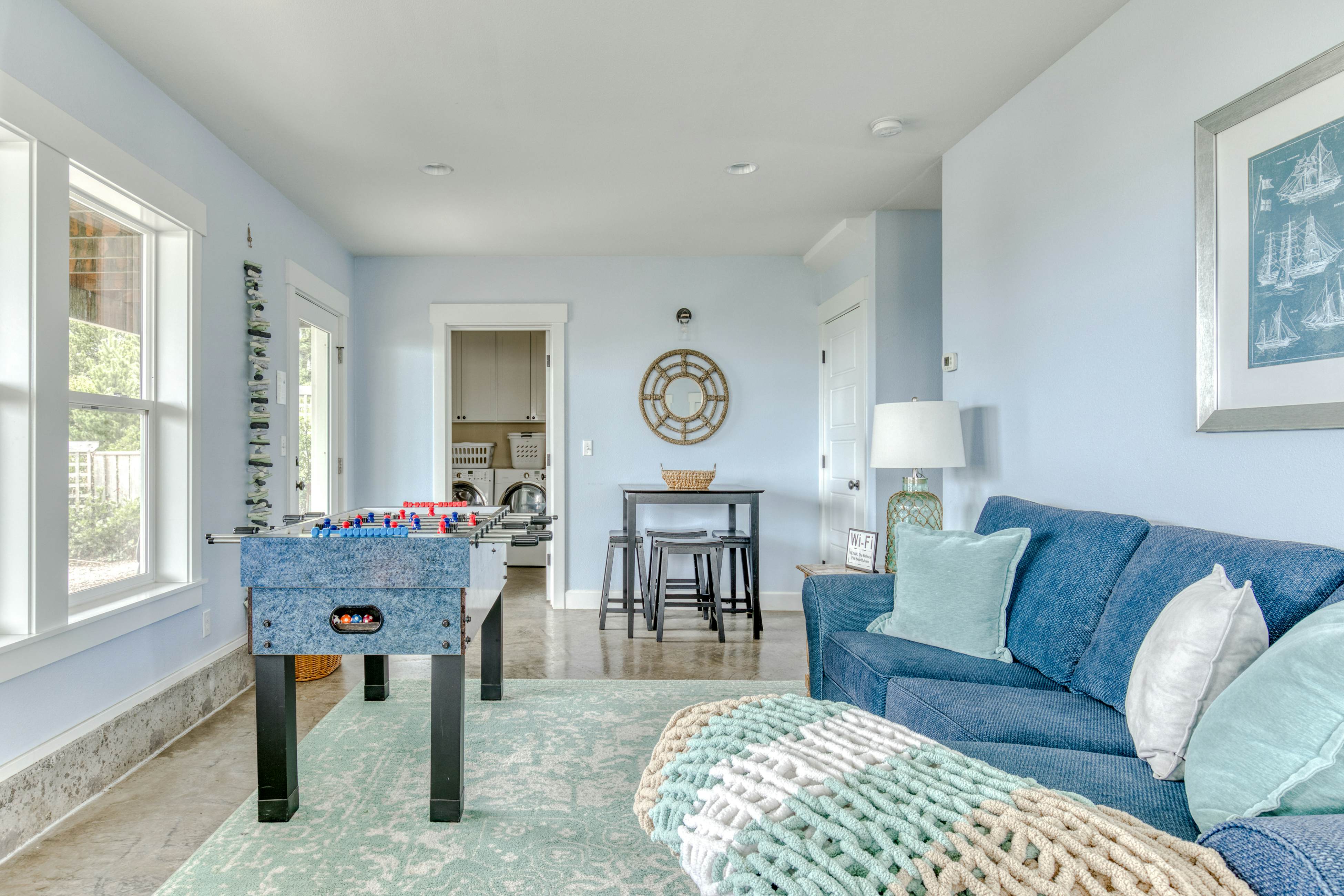 Ocean-view home with hot tub, game room, furnished deck, & fireplaces