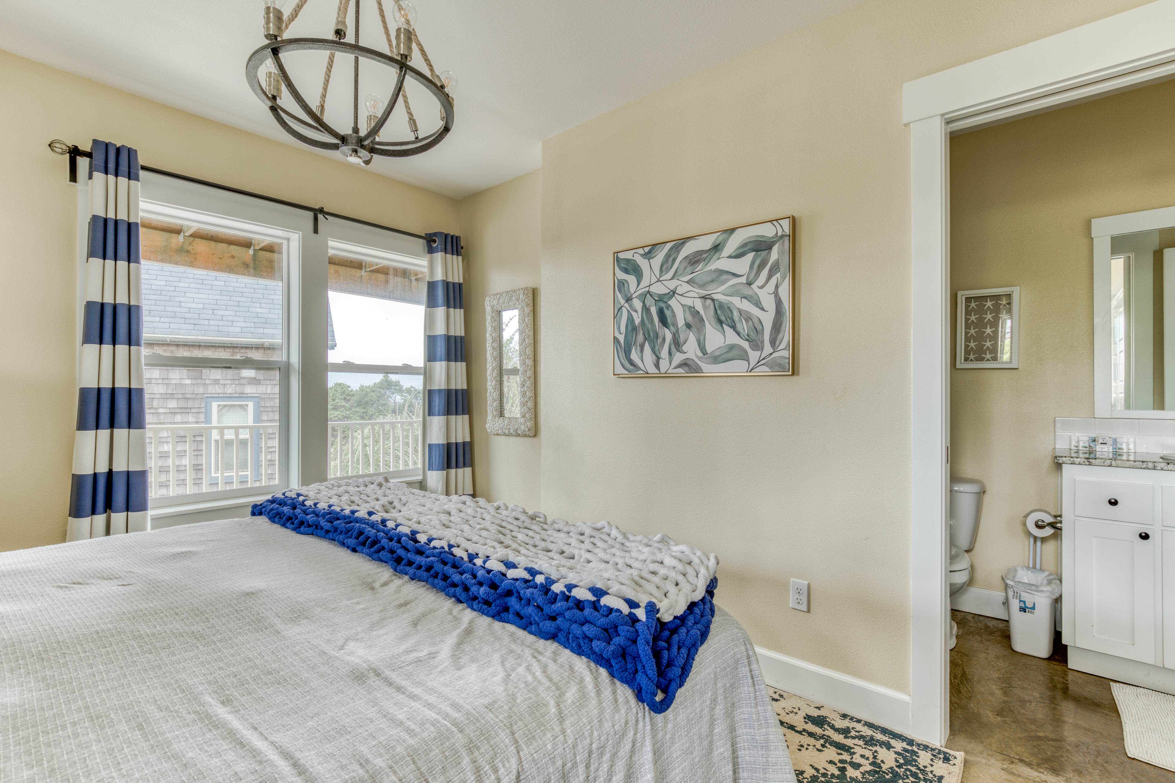 Ocean-view home with hot tub, game room, furnished deck, & fireplaces