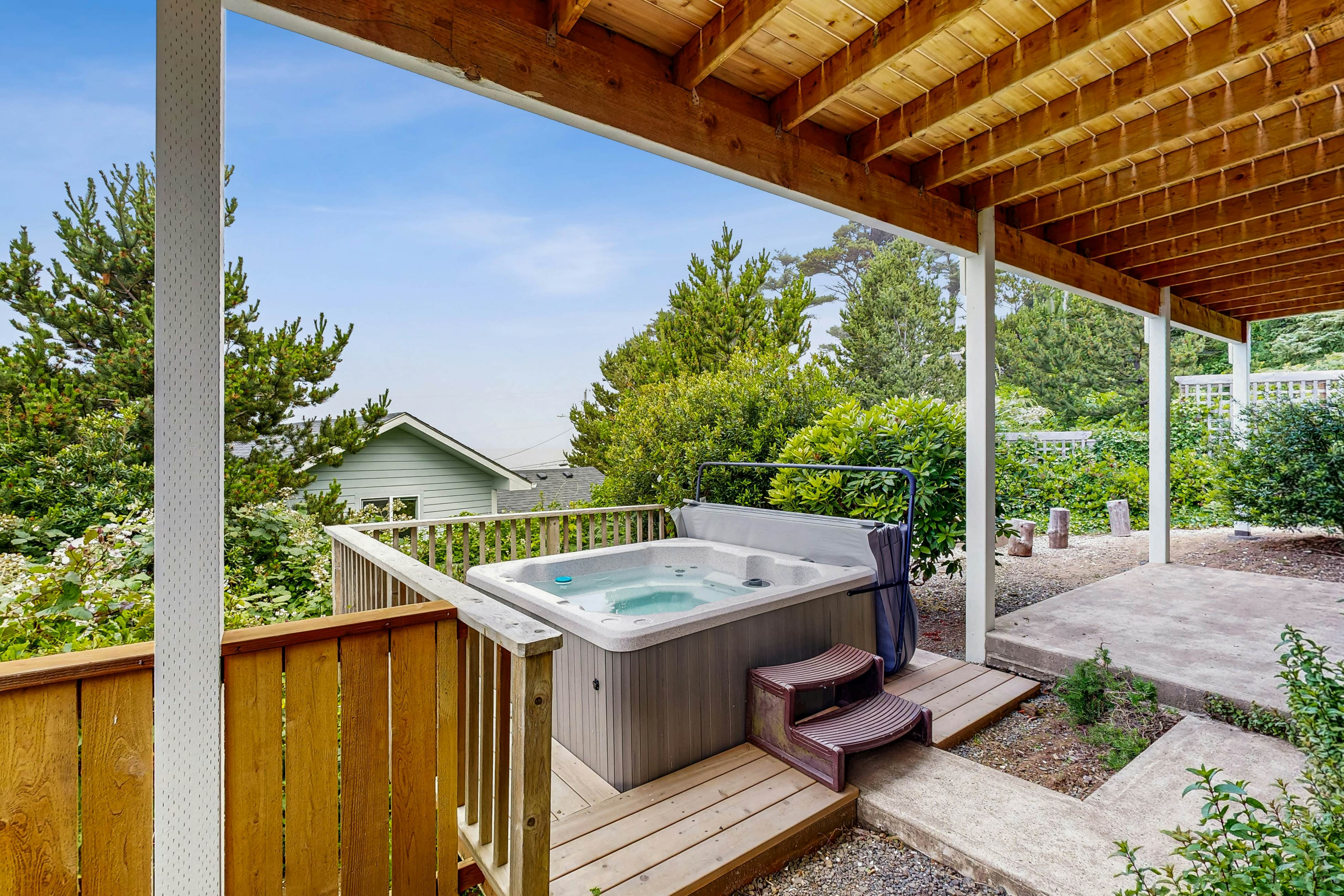 Ocean-view home with hot tub, game room, furnished deck, & fireplaces