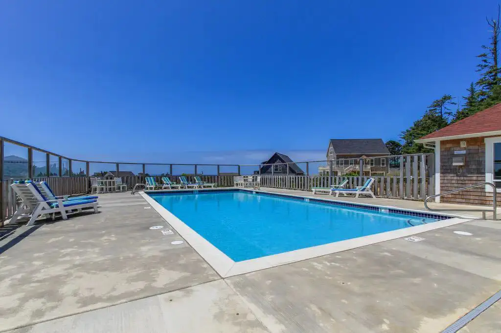 Ocean view home with hot tub game room furnished deck and fireplaces