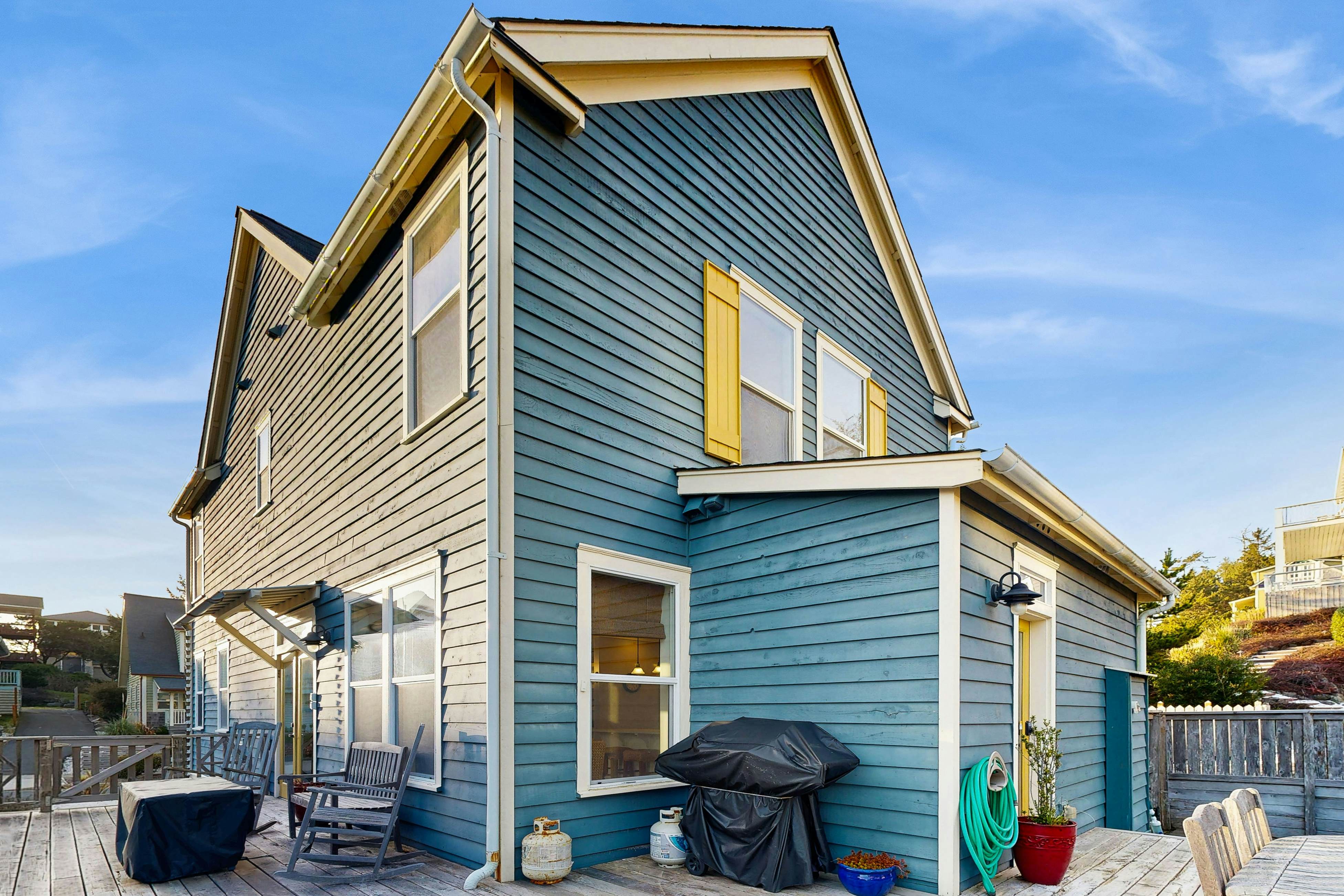 Charming, two-story home with a private hot tub, large patio, & washer/dryer