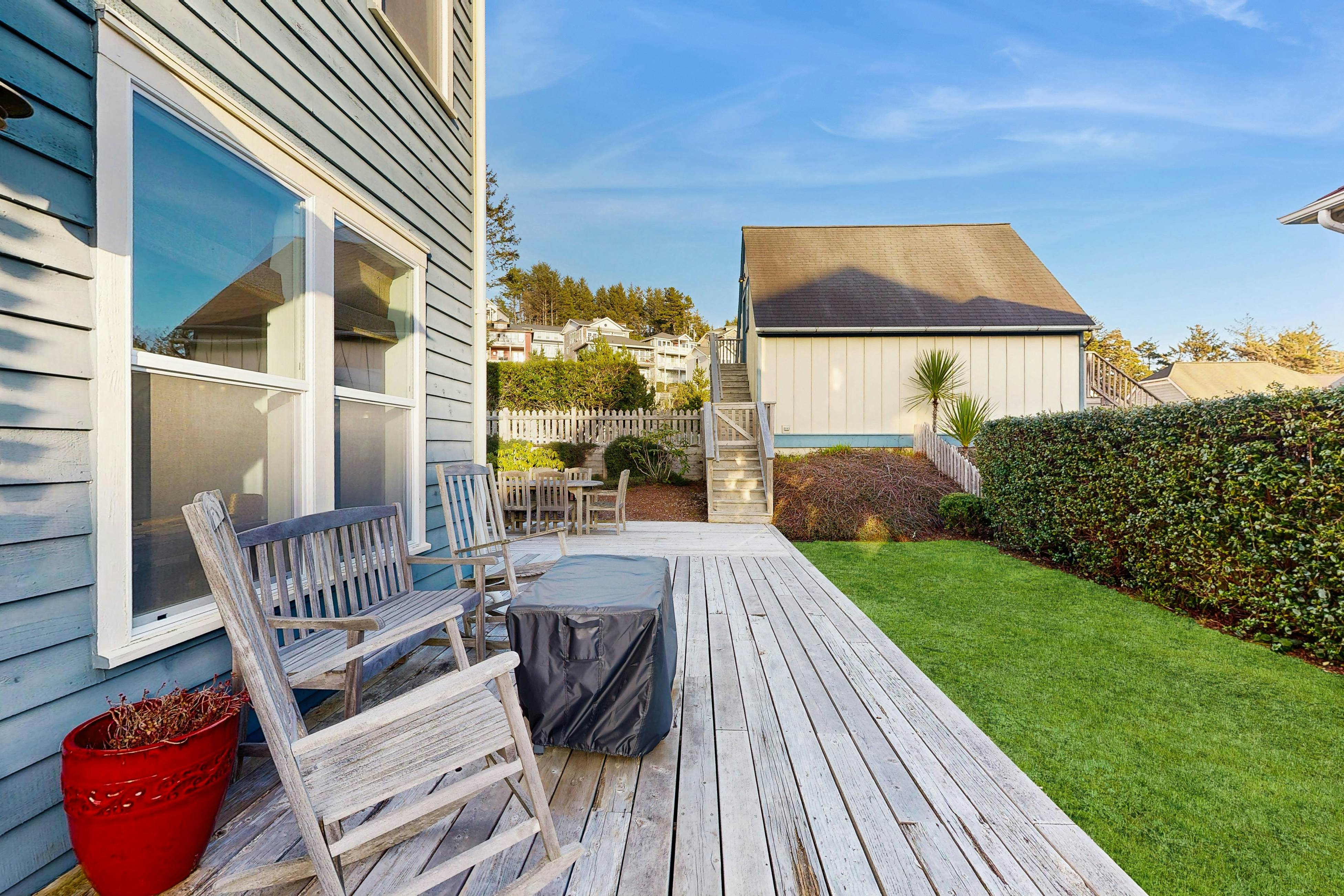 Charming, two-story home with a private hot tub, large patio, & washer/dryer