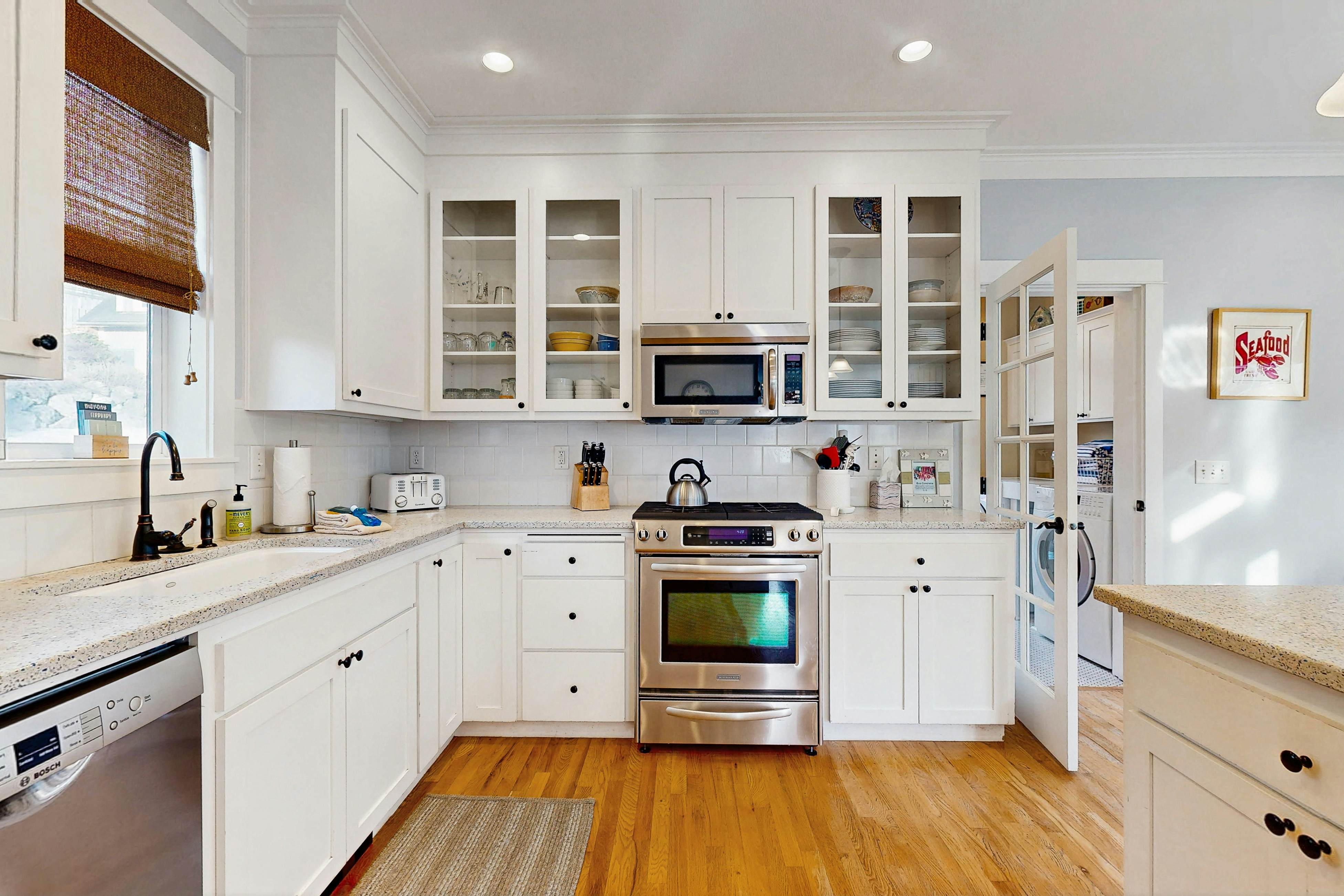 Charming, two-story home with a private hot tub, large patio, & washer/dryer