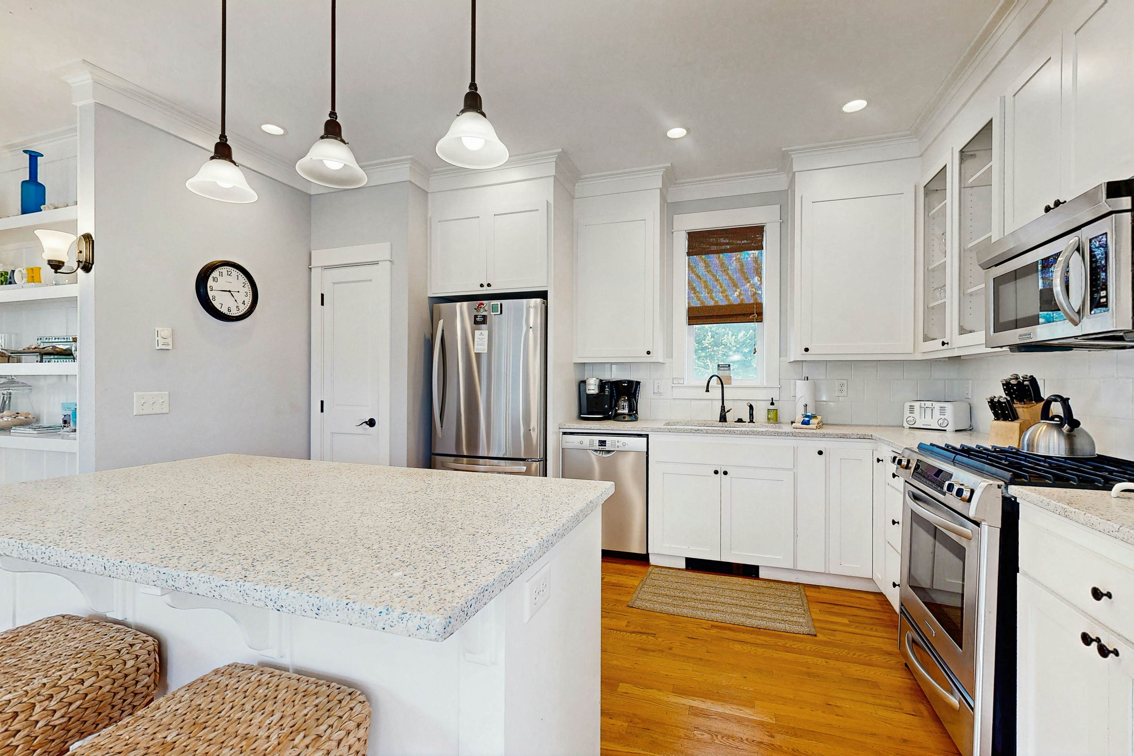 Charming, two-story home with a private hot tub, large patio, & washer/dryer