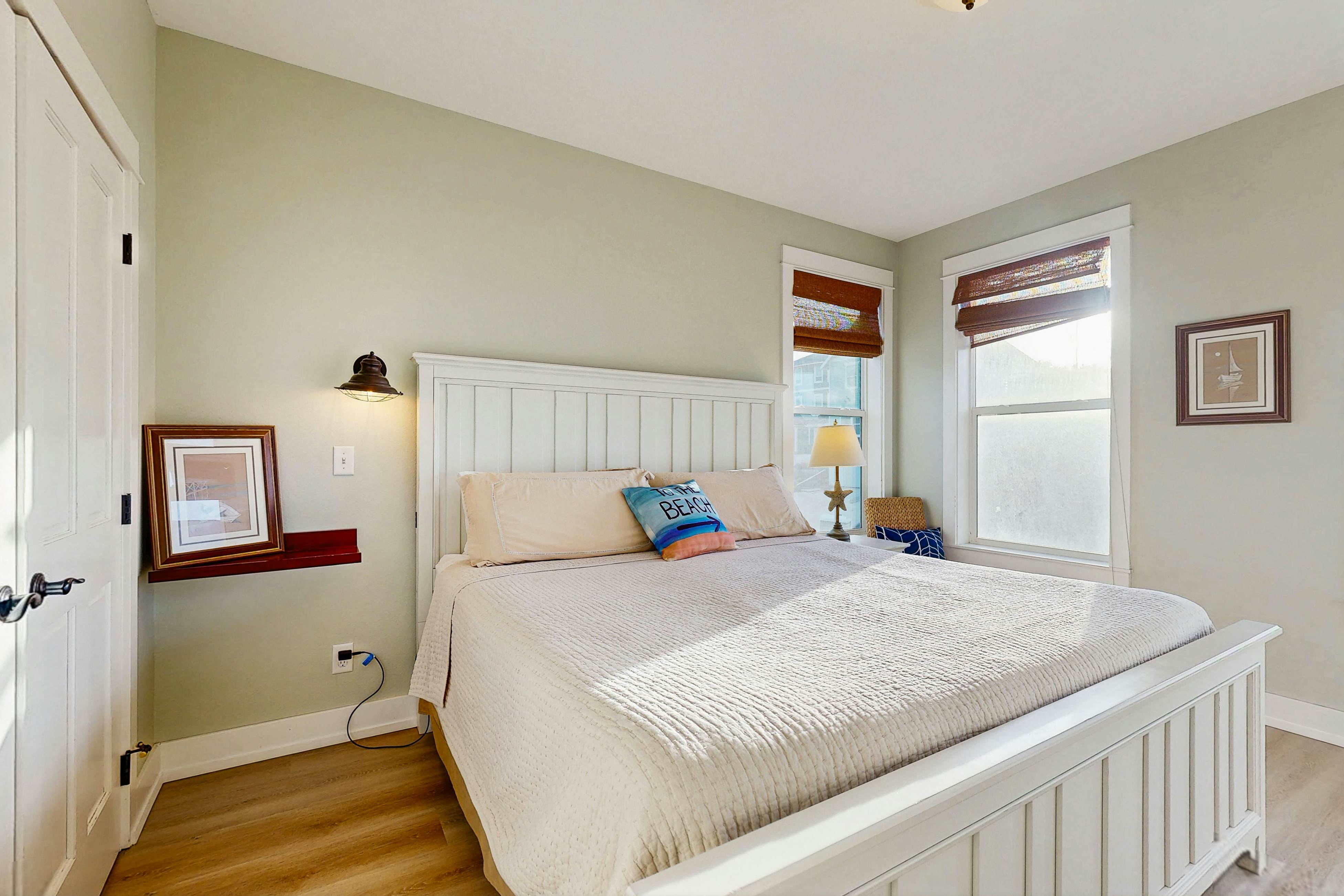 Charming, two-story home with a private hot tub, large patio, & washer/dryer