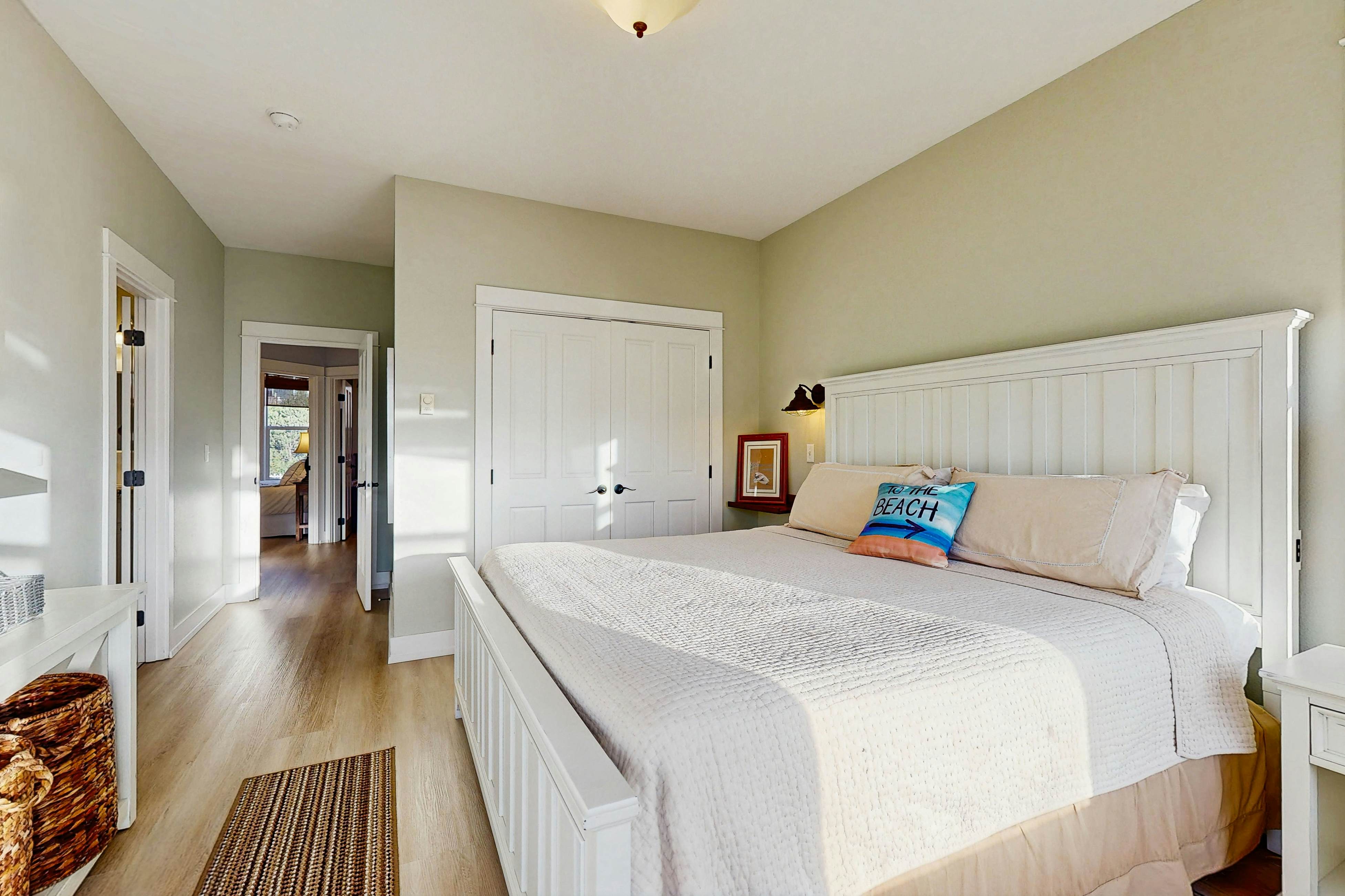 Charming, two-story home with a private hot tub, large patio, & washer/dryer