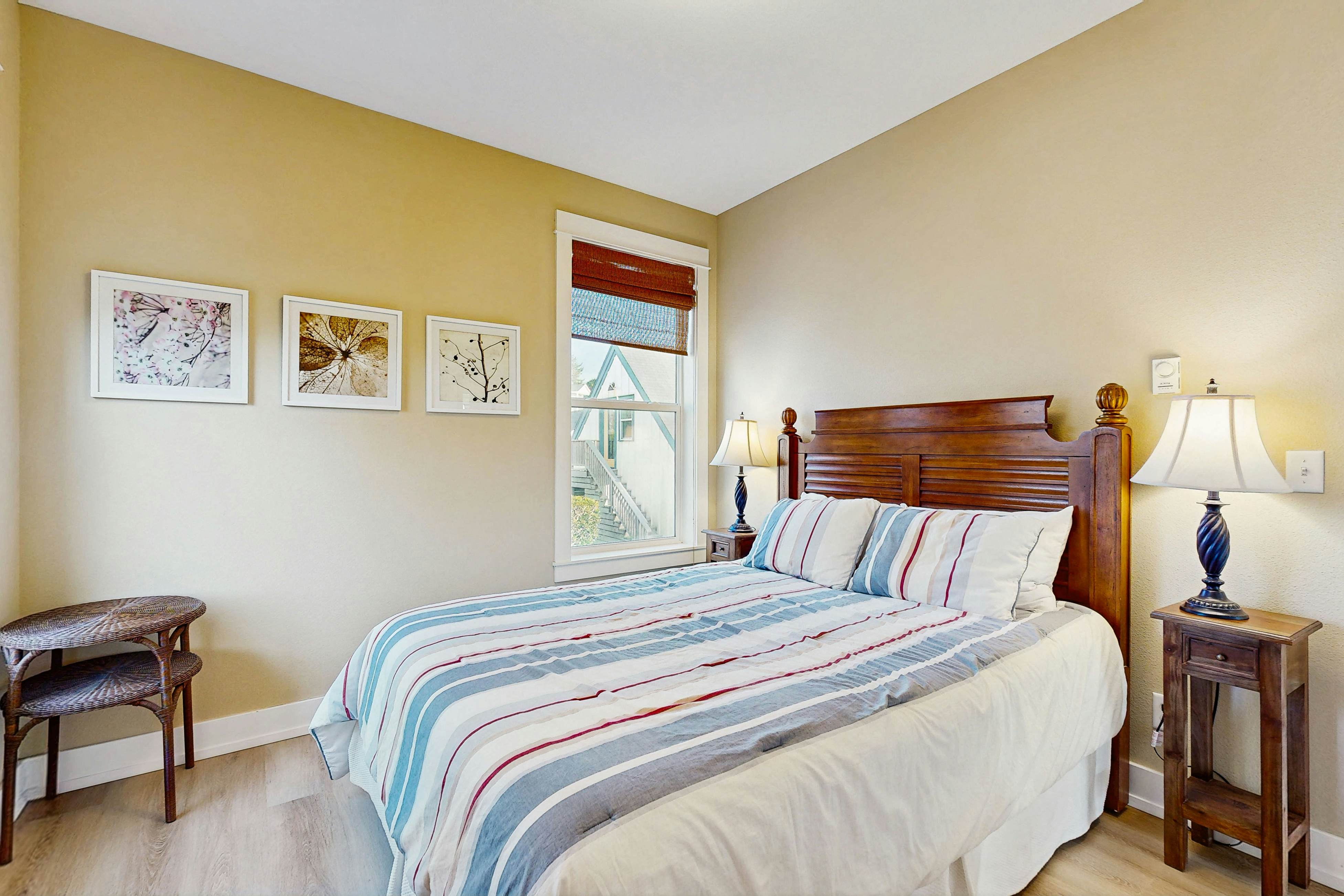 Charming, two-story home with a private hot tub, large patio, & washer/dryer