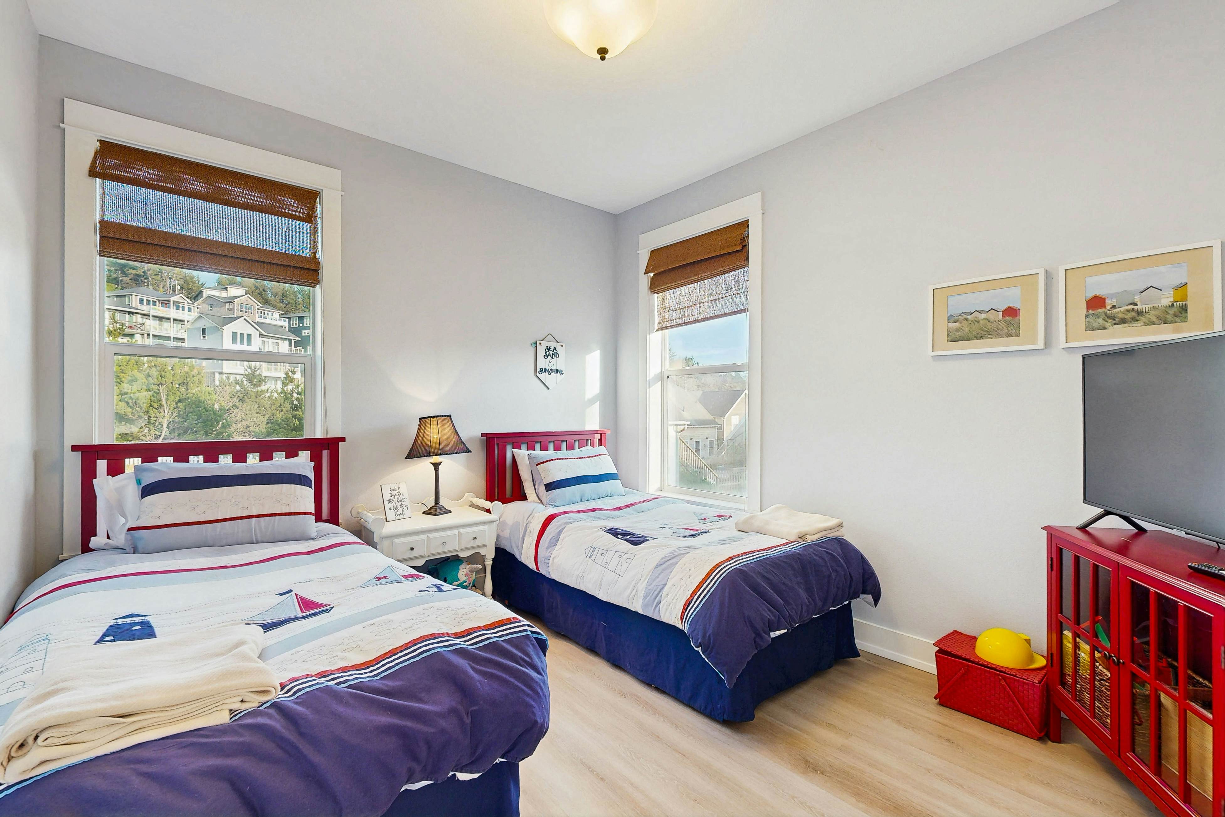 Charming, two-story home with a private hot tub, large patio, & washer/dryer