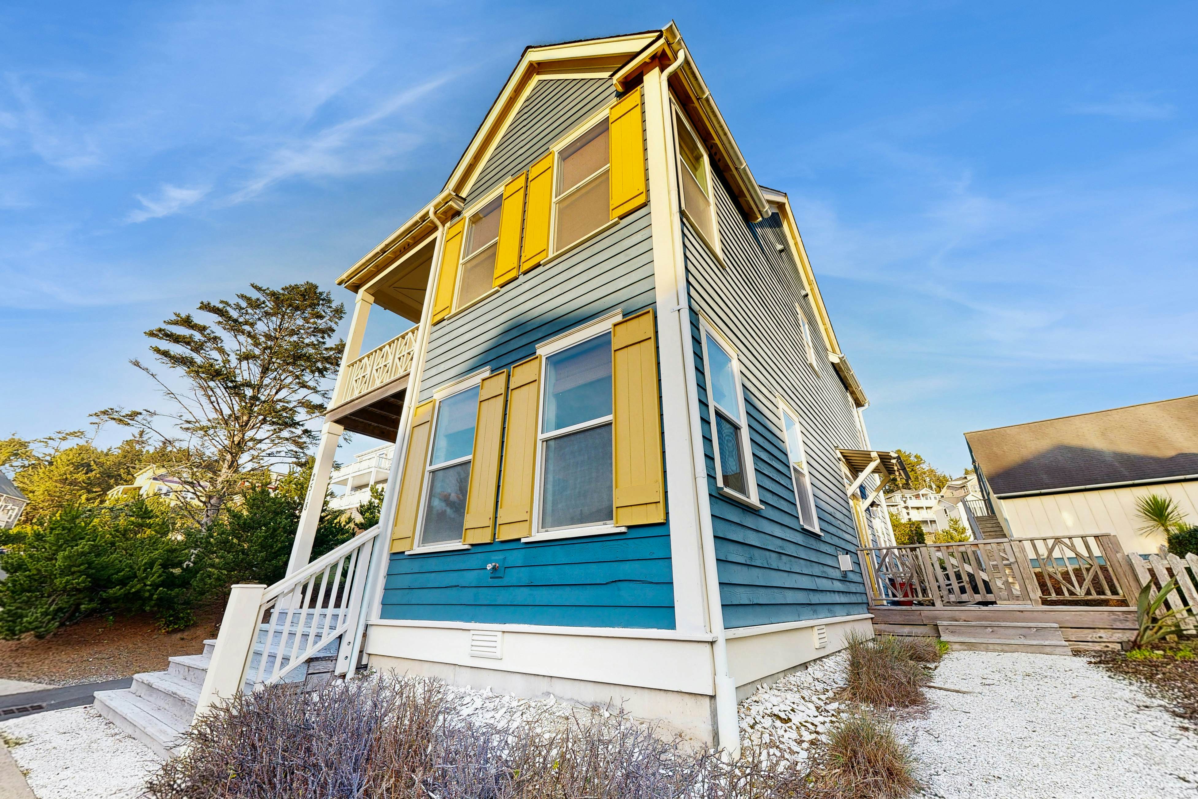 Charming, two-story home with a private hot tub, large patio, & washer/dryer