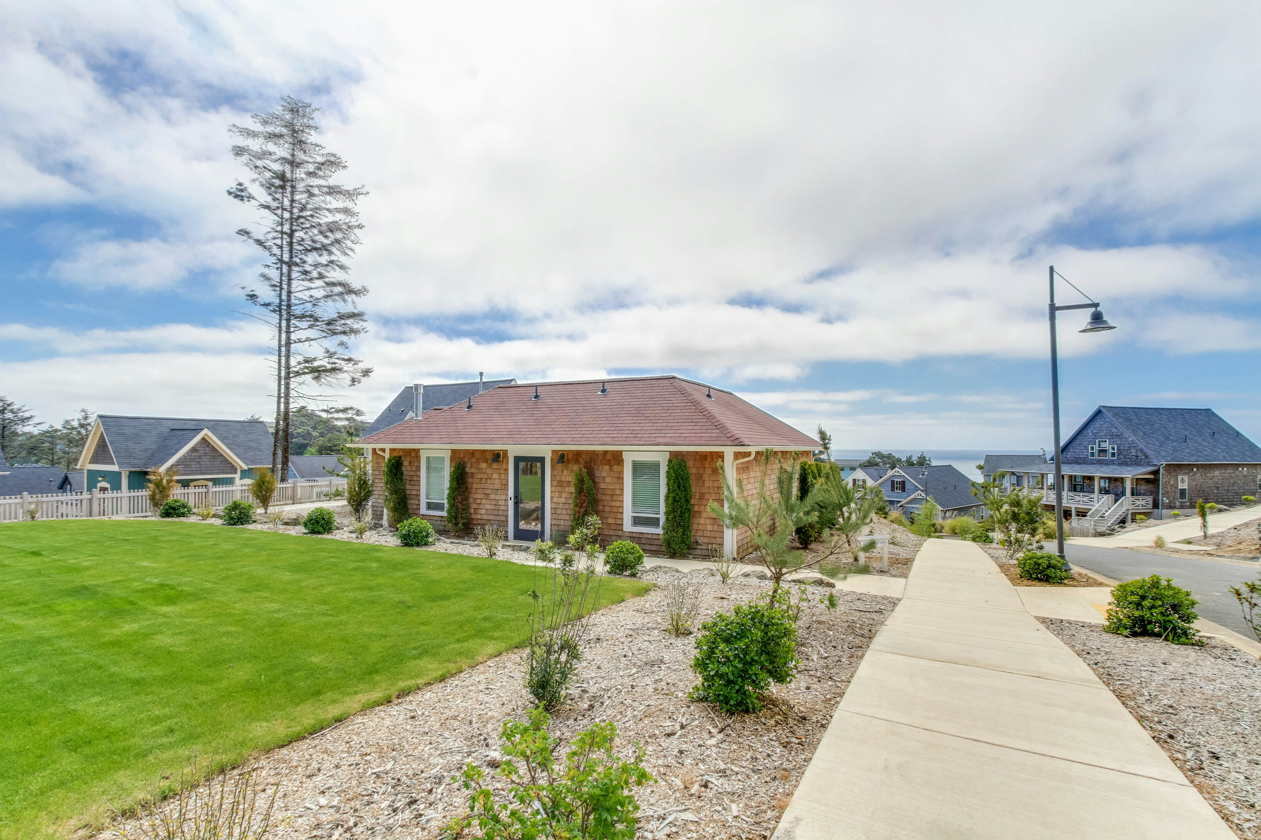 Charming, two-story home with a private hot tub, large patio, & washer/dryer