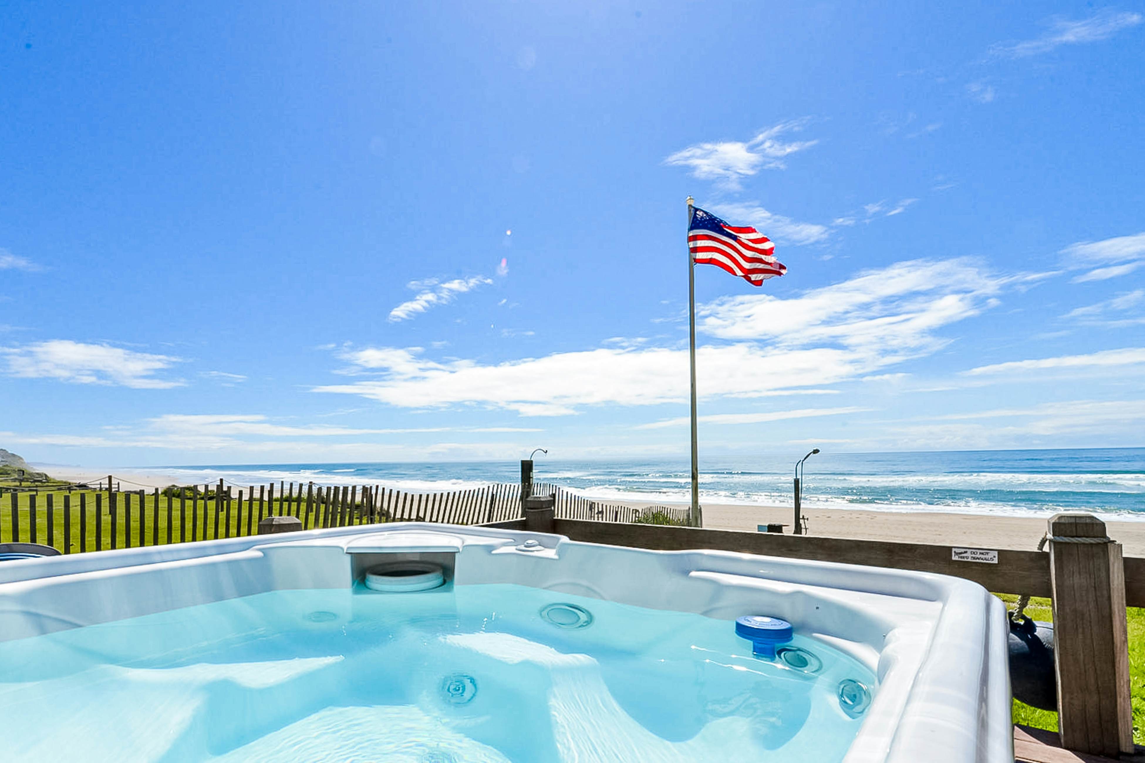 Beachfront ocean-view duplex with private beach, hot tub, grill, outdoor shower