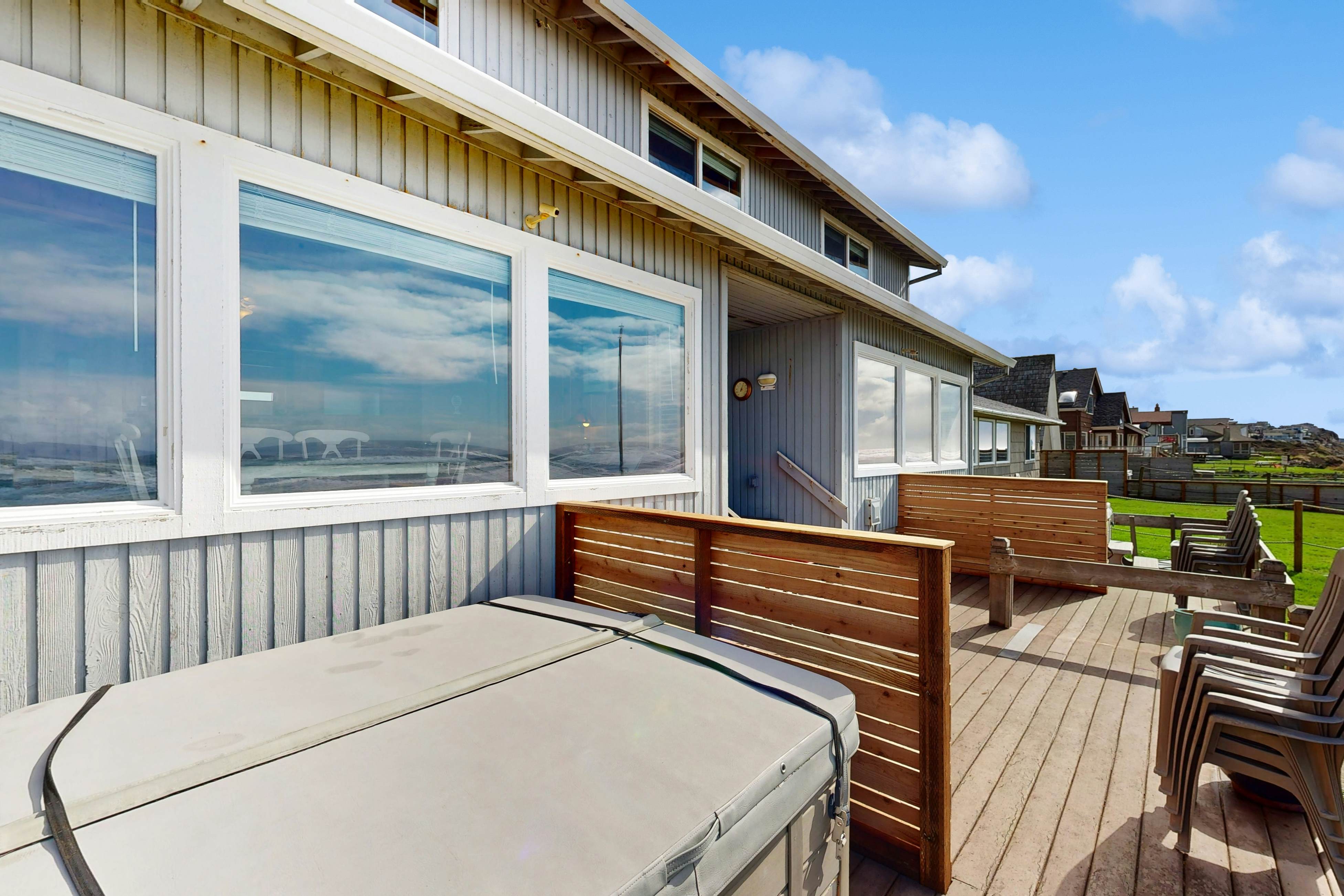 Beachfront ocean-view duplex with private beach, hot tub, grill, outdoor shower