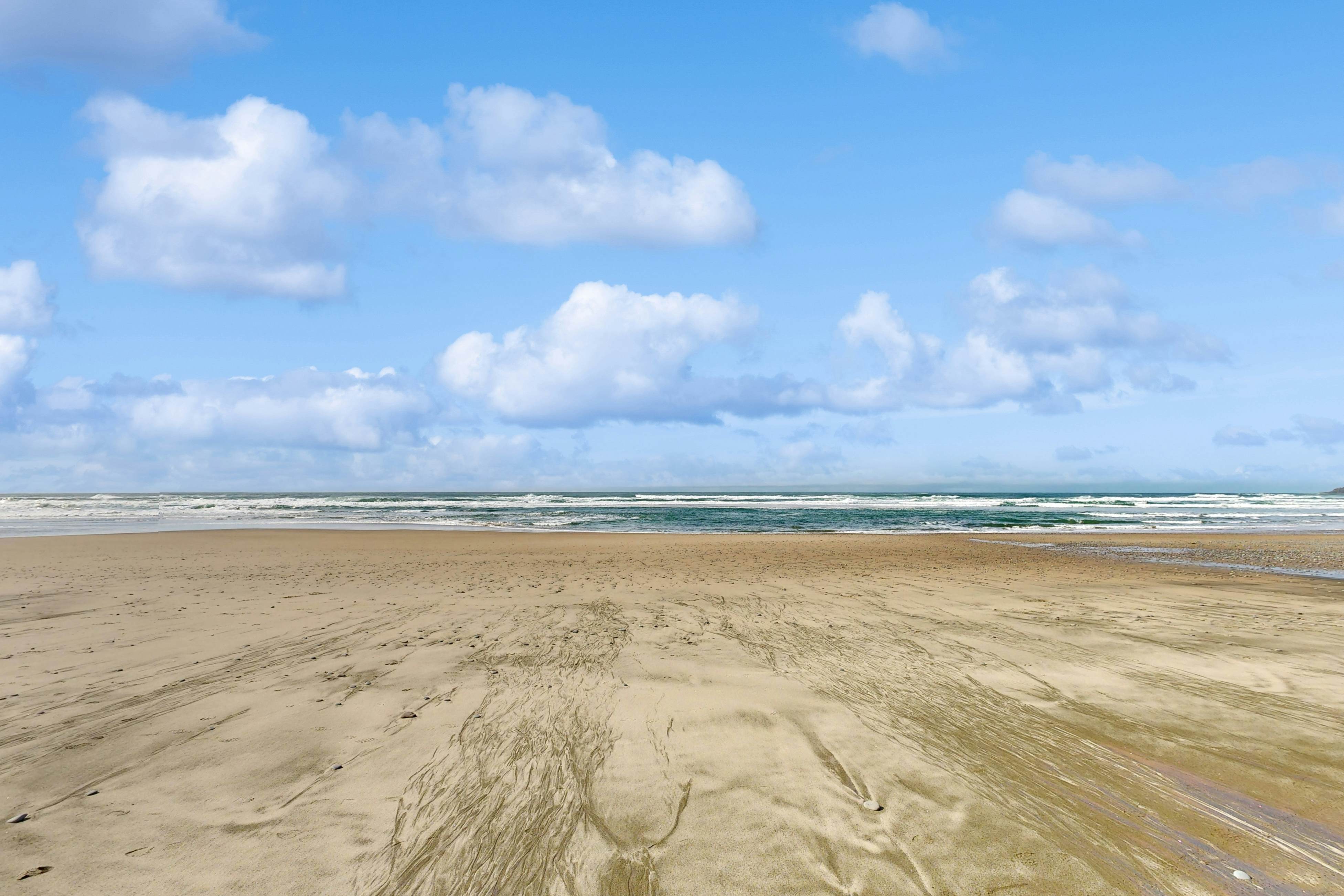 Beachfront ocean-view duplex with private beach, hot tub, grill, outdoor shower