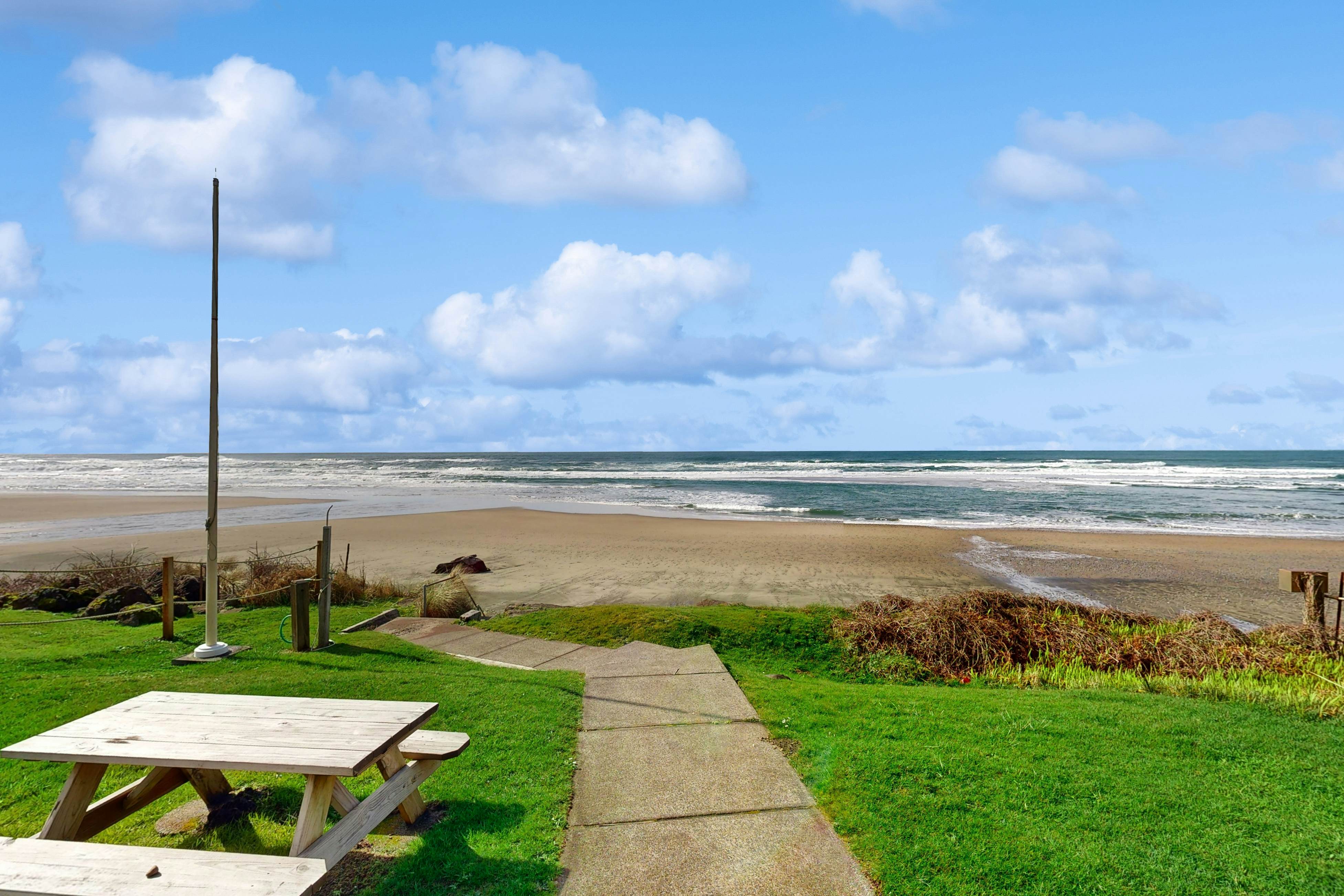 Beachfront ocean-view duplex with private beach, hot tub, grill, outdoor shower